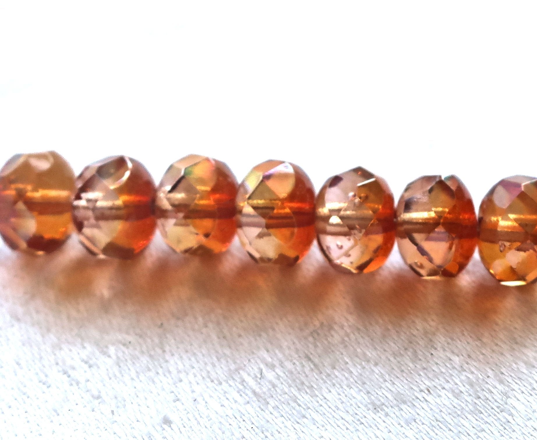 25 Czech glass puffy rondelles, 6 x 8mm transparent pink / apricot AB color mix, faceted puffy rondelle beads, sale price 50101 - Glorious Glass Beads