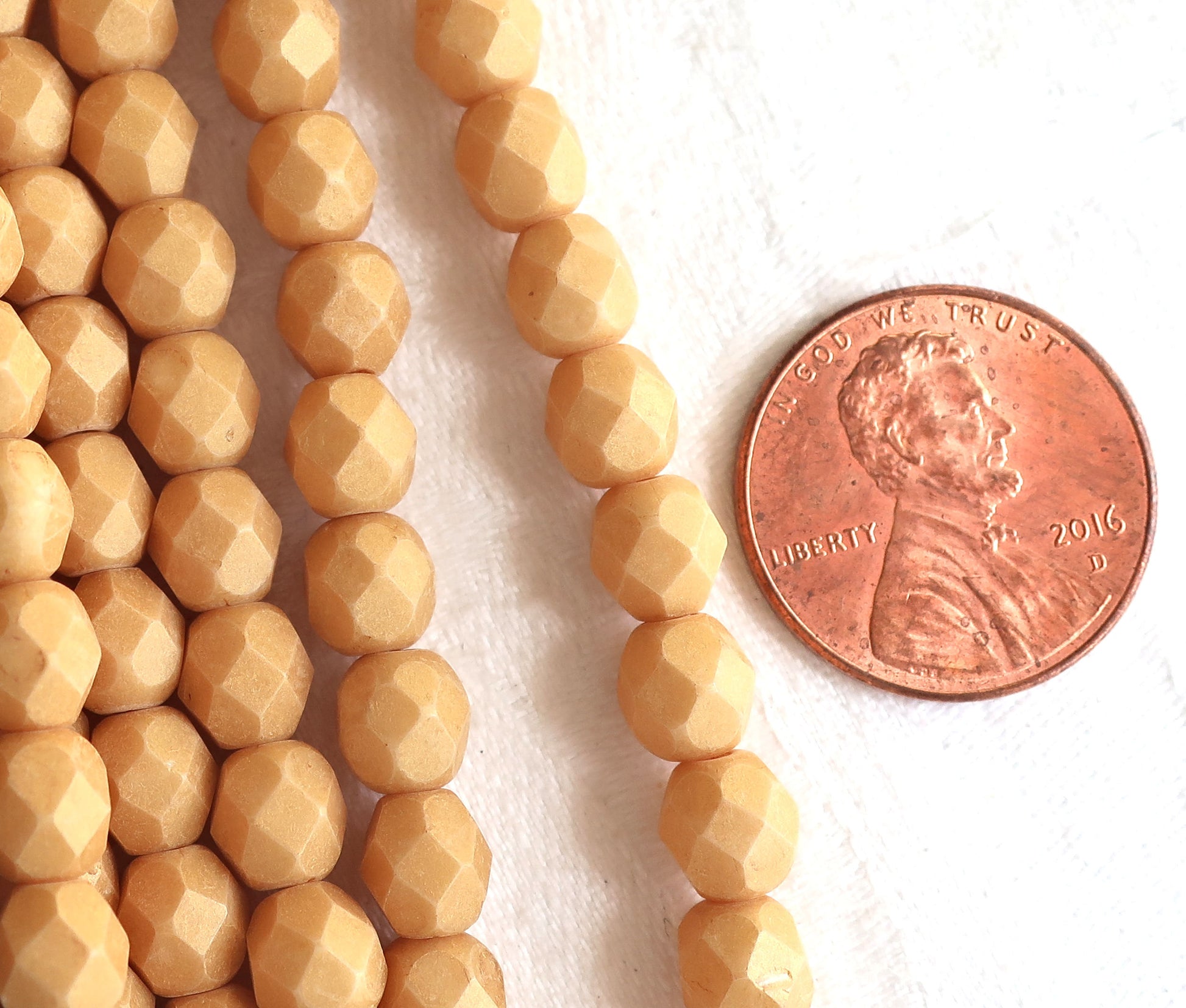 Lot of 25 6mm Czech glass druks, neutral opaque beige, yellow / gold Pacifica Ginger smooth round druk beads C8601 - Glorious Glass Beads