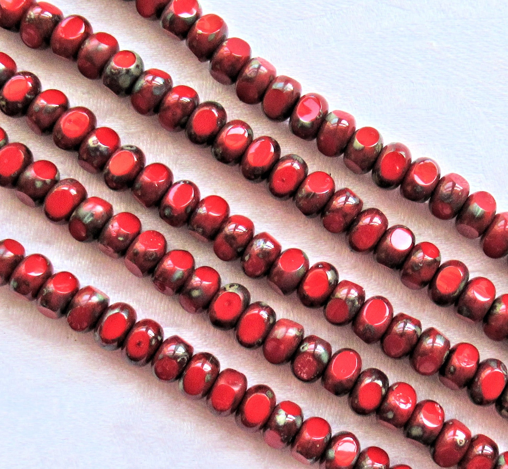 Strand of 37 Tricut - Tri-cut - Round opaque red picasso Czech glass beads - table cut 7mm x 4mm rustic earthy beads C00219 - Glorious Glass Beads