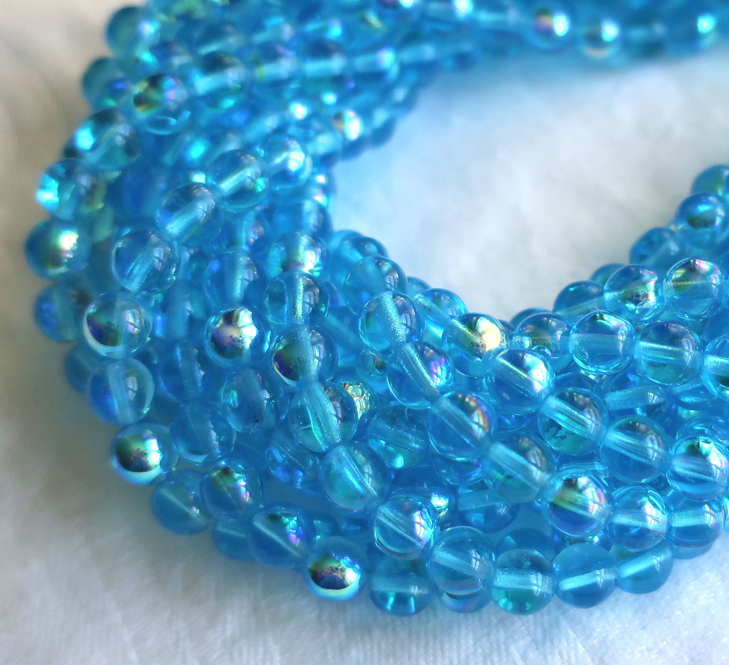 Lot of 50 6mm Czech glass beads, Aqua Blue AB smooth round druk beads C3750 - Glorious Glass Beads