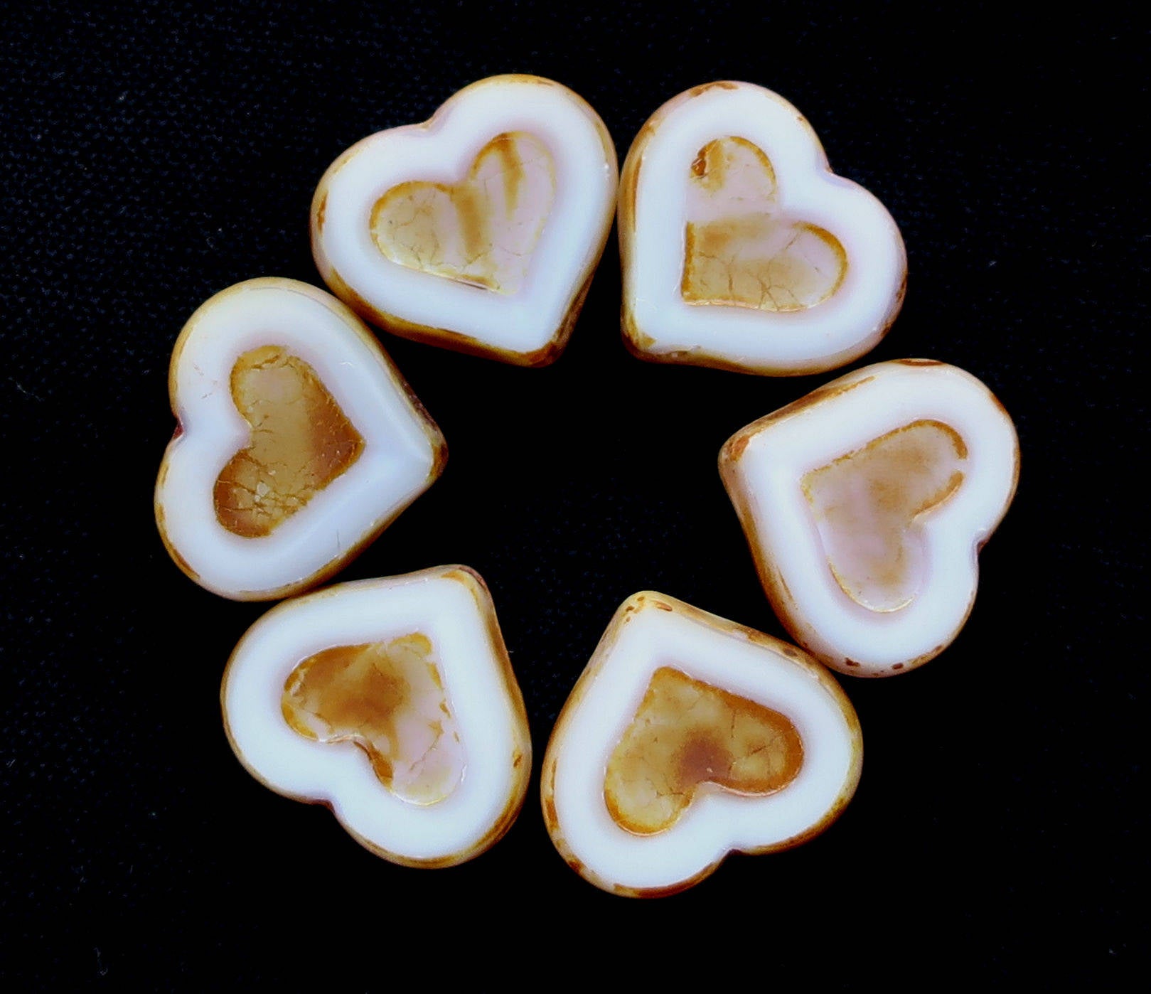 Six Czech glass heart beads; 14 x 12mm table cut, carved, opaque white glass hearts with a picasso finish C6906 - Glorious Glass Beads