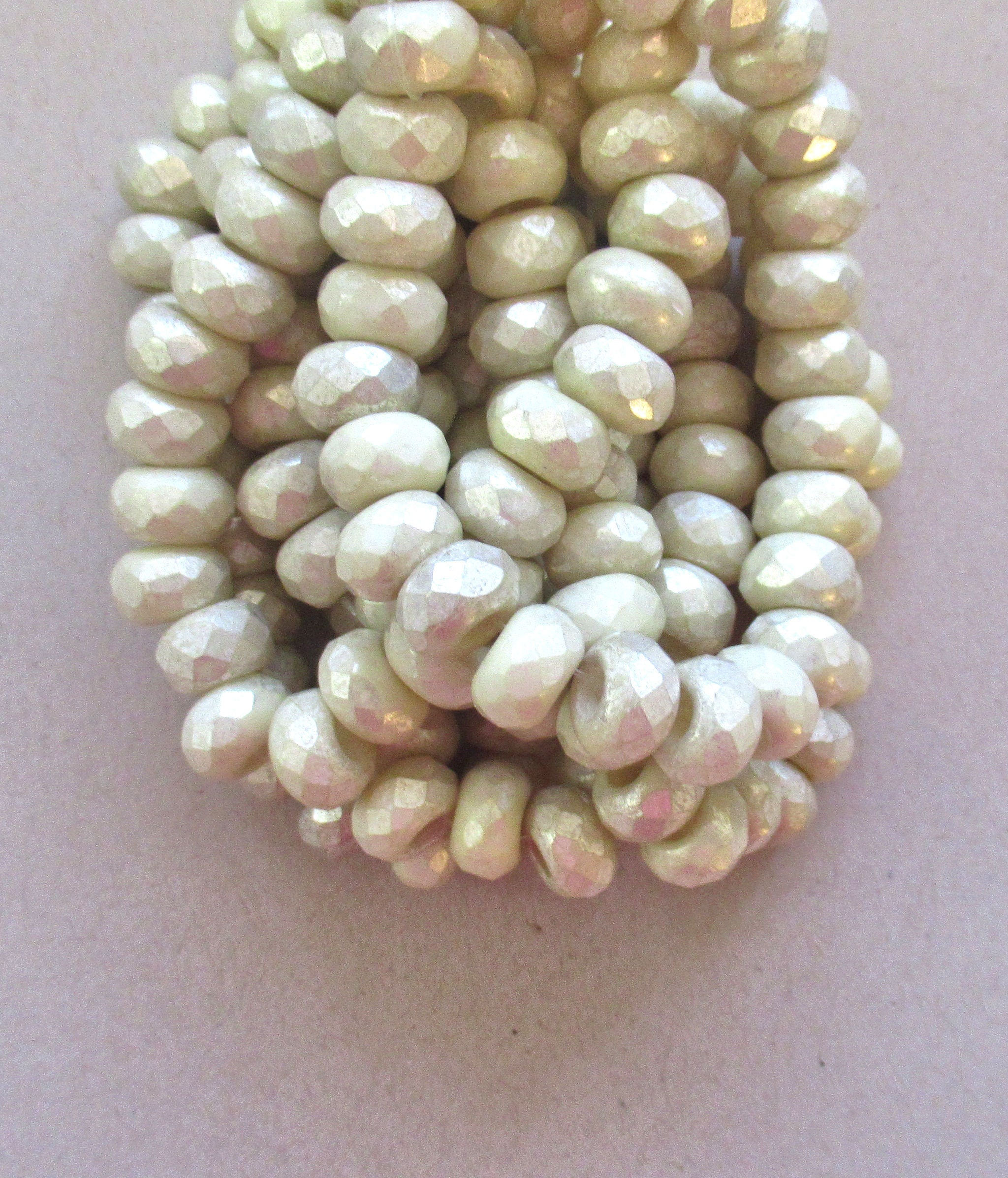 Ten Czech glass roller beads - 6 x 9mm off white or ecru w/ a silvery mercury finish faceted roller, rondelle, big 3.5mm hole beads C0099