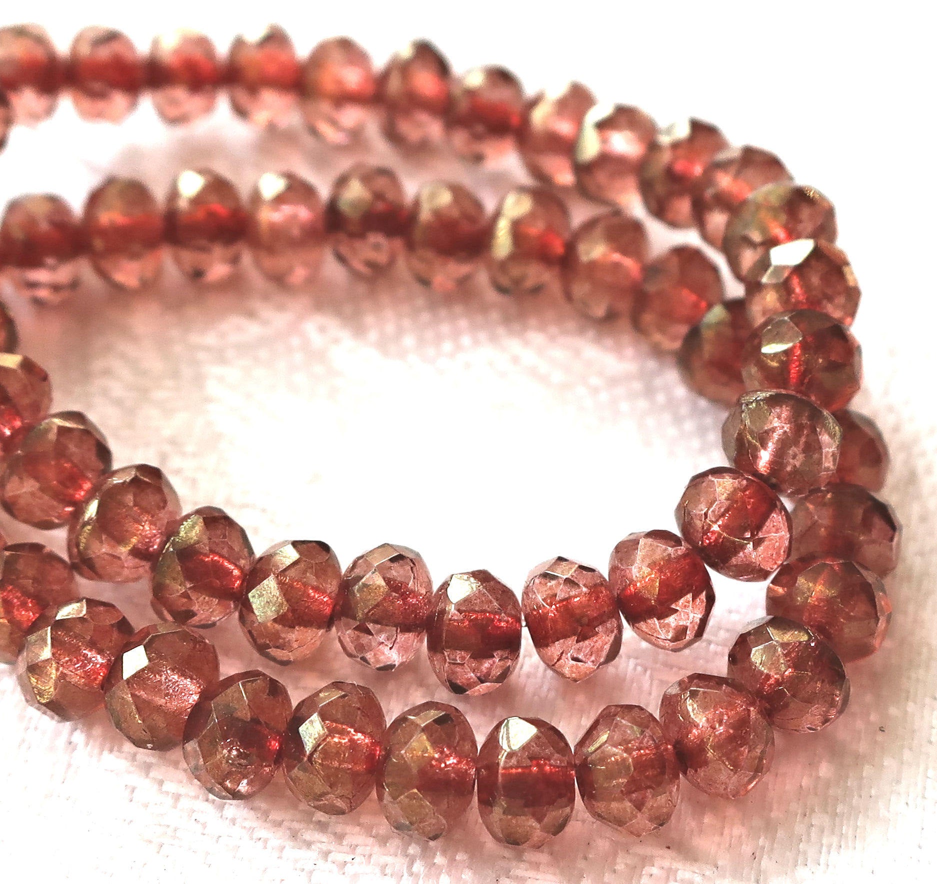 Lot of 30 small pink luster puffy rondelle beads, 3mm x 5mm faceted Czech glass rondelles 91101 - Glorious Glass Beads