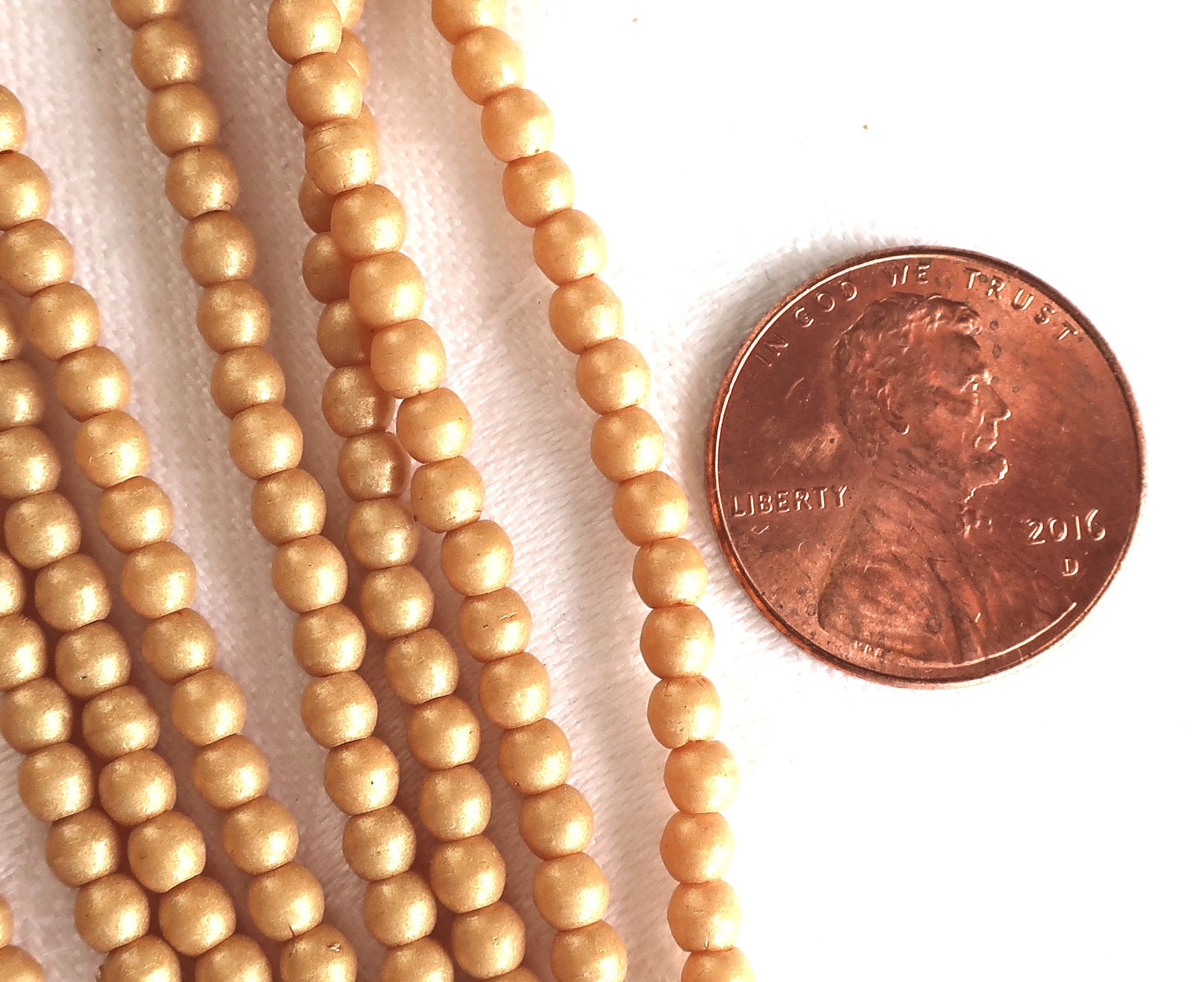 Lot of 100 3mm Czech glass druks, opaque beige, yellow / gold Pacifica Ginger smooth round druk beads C7750 - Glorious Glass Beads