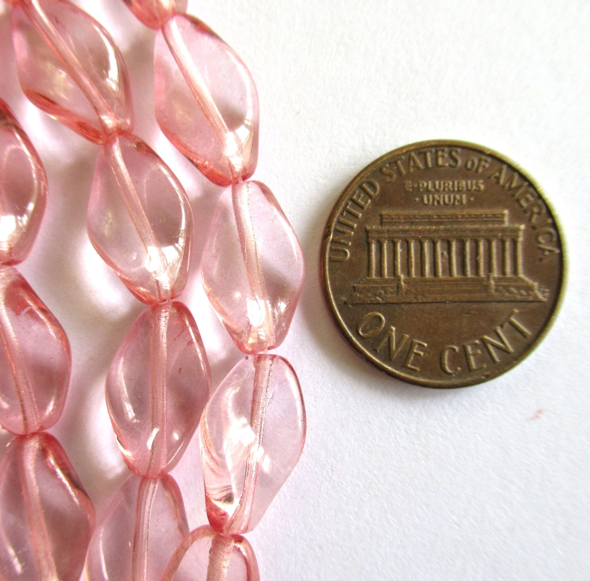 25 Czech Glass twisted oval beads - 13mm x 8mm transparent pink pressed glass beads 0078