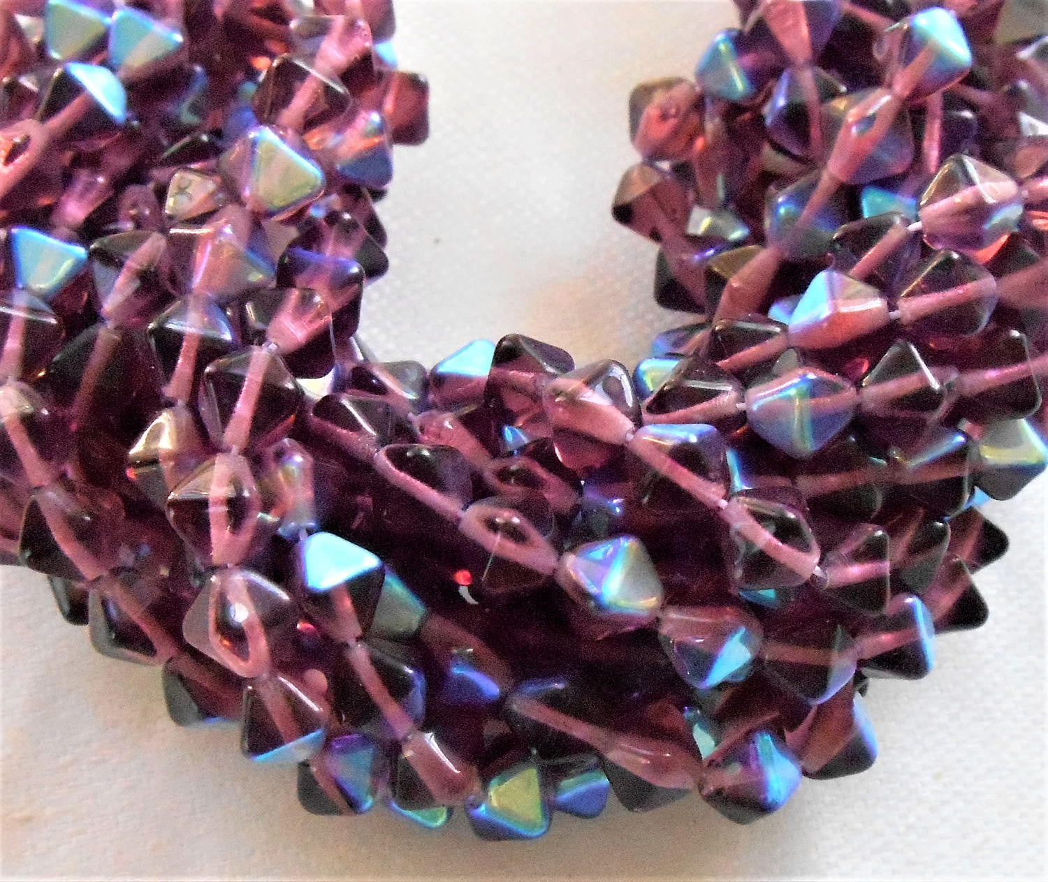 Fifty 6mm Amethyst AB bicones, Purple AB pressed glass Czech bicone beads C2701 - Glorious Glass Beads