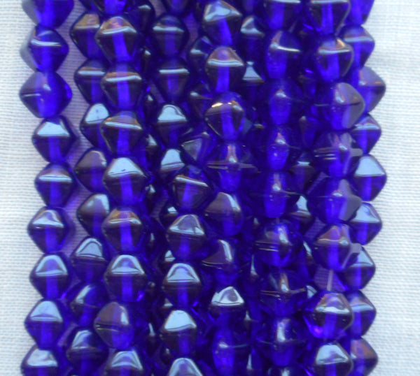 Fifty 6mm Cobalt Blue bicone pressed glass Czech beads, C0093