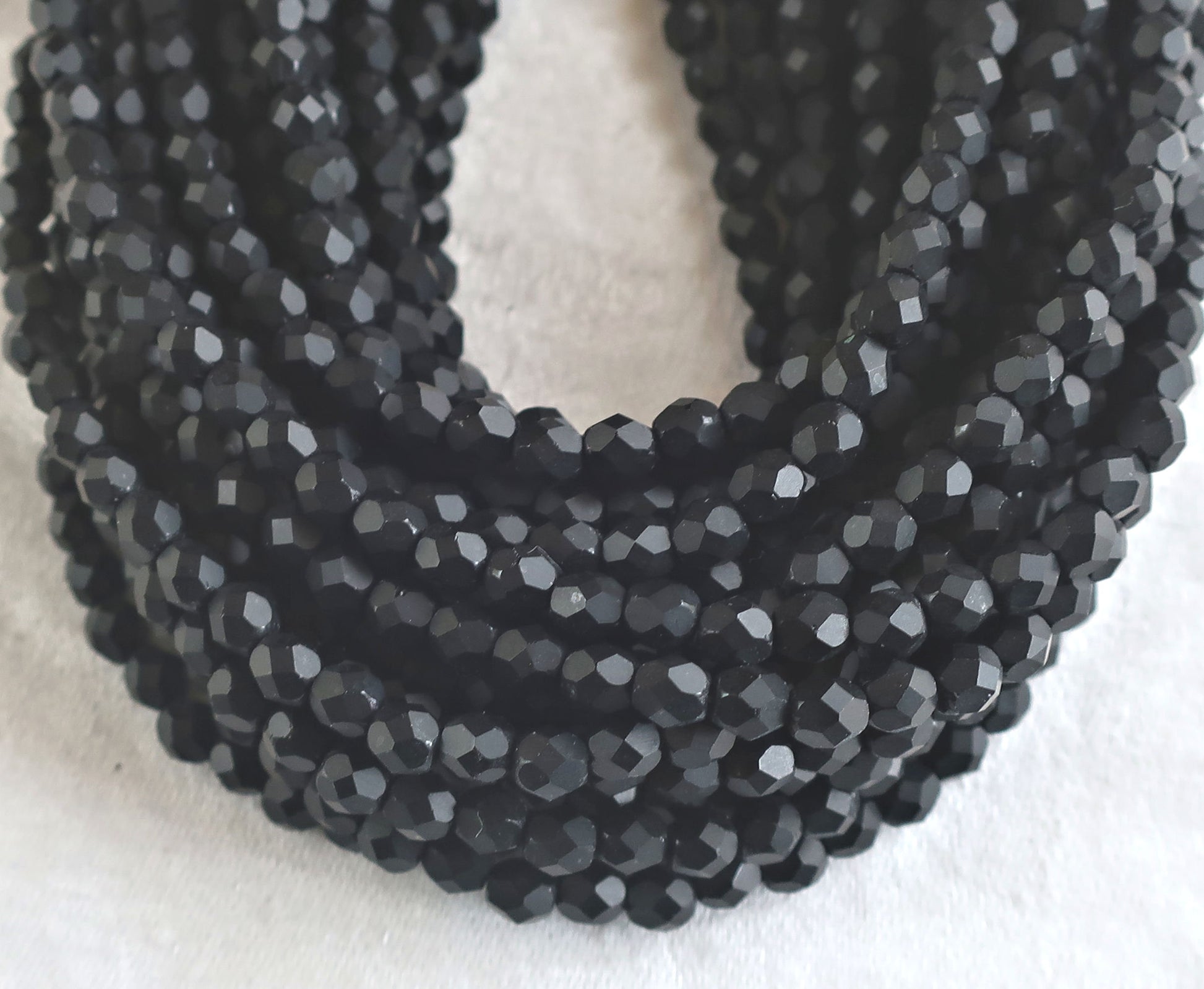 Lot of 50 4mm matte Jet Black Czech glass beads, round faceted firepolished beads, C3450 - Glorious Glass Beads