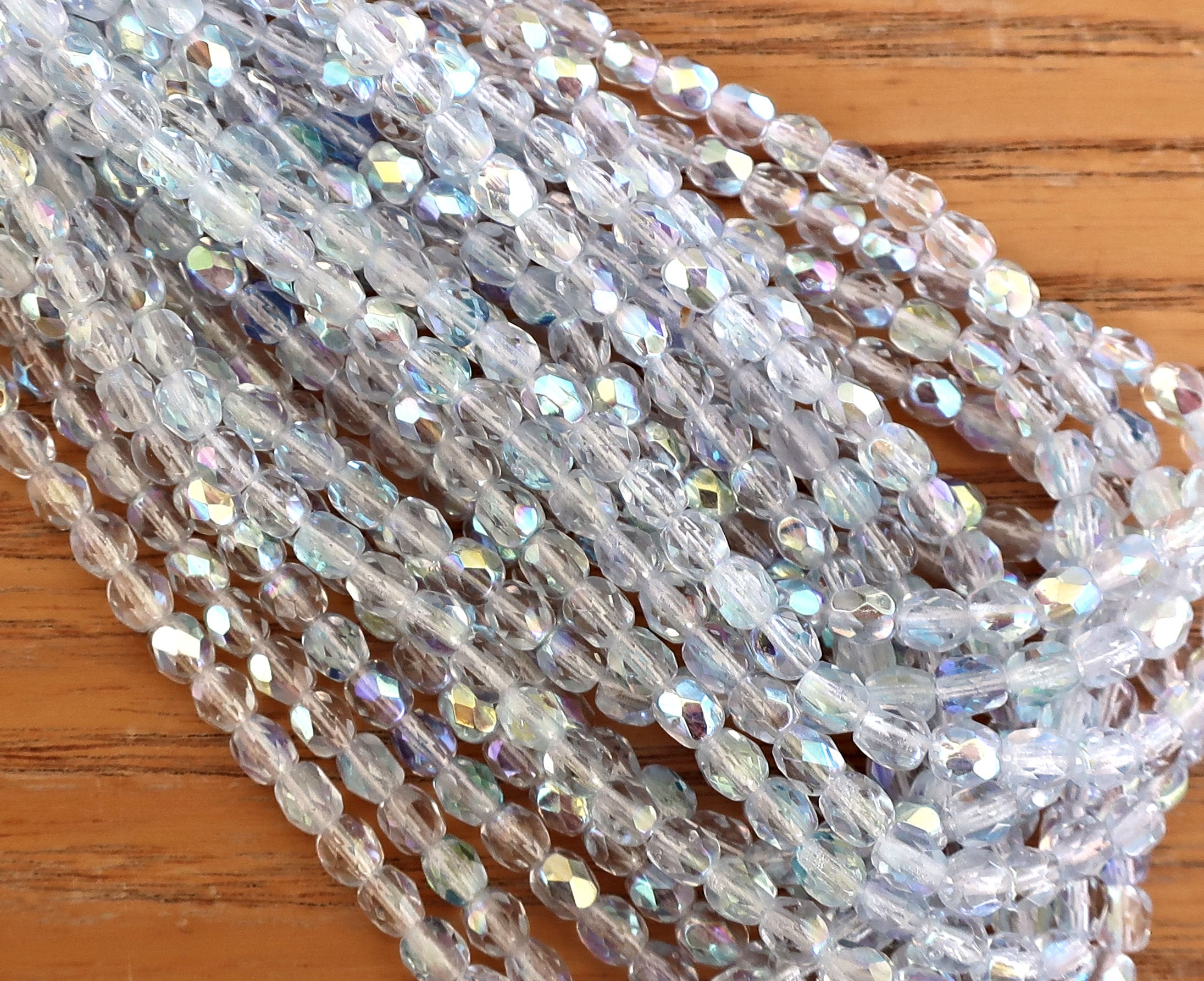 Lot of 50 4mm Czech Light Sapphire Blue AB Czech glass beads, firepolished faceted round beads C3650 - Glorious Glass Beads