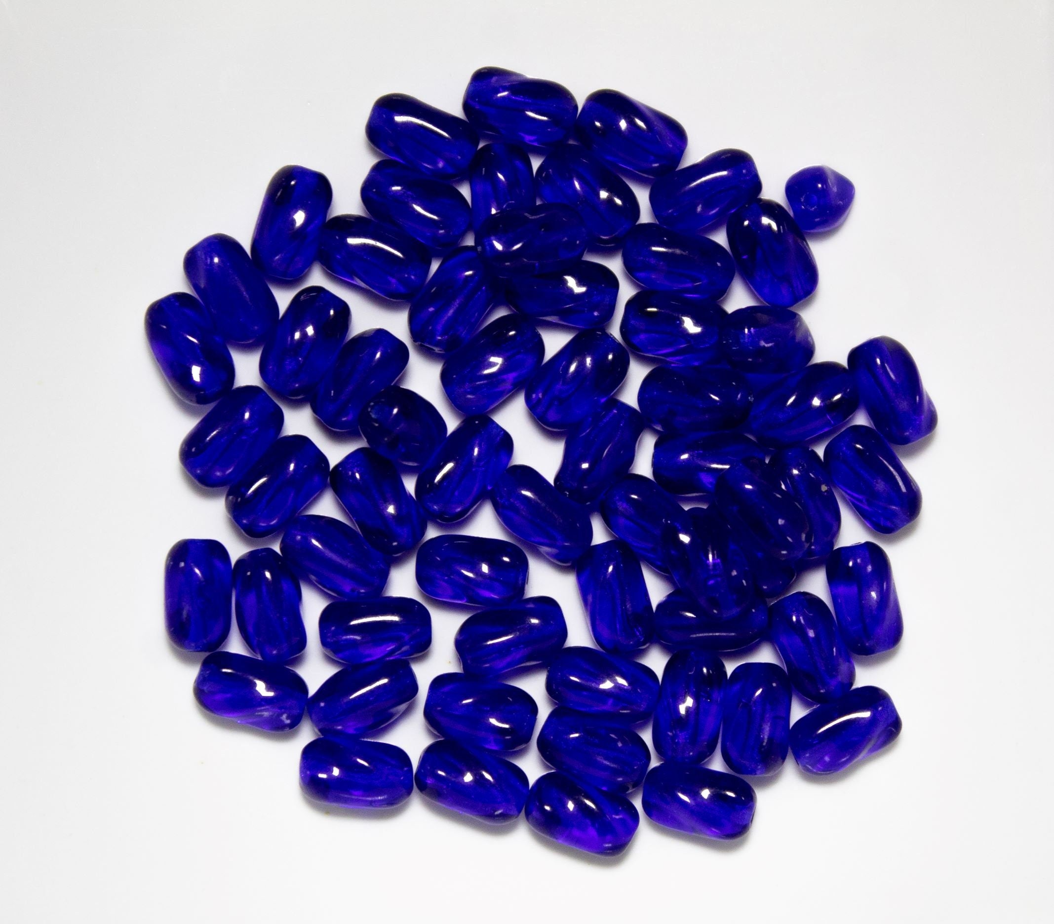 25 9mm x 6mm Cobalt Blue Czech glass twisted oval beads C0004
