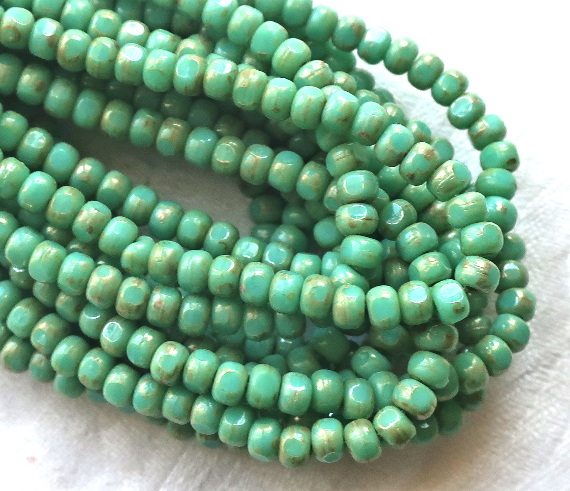 50 4 x 3mm, Tricut, Tri-cut, 3 cut Round Czech glass beads, turquoise green.picasso 6/0 seed beads C66101 - Glorious Glass Beads