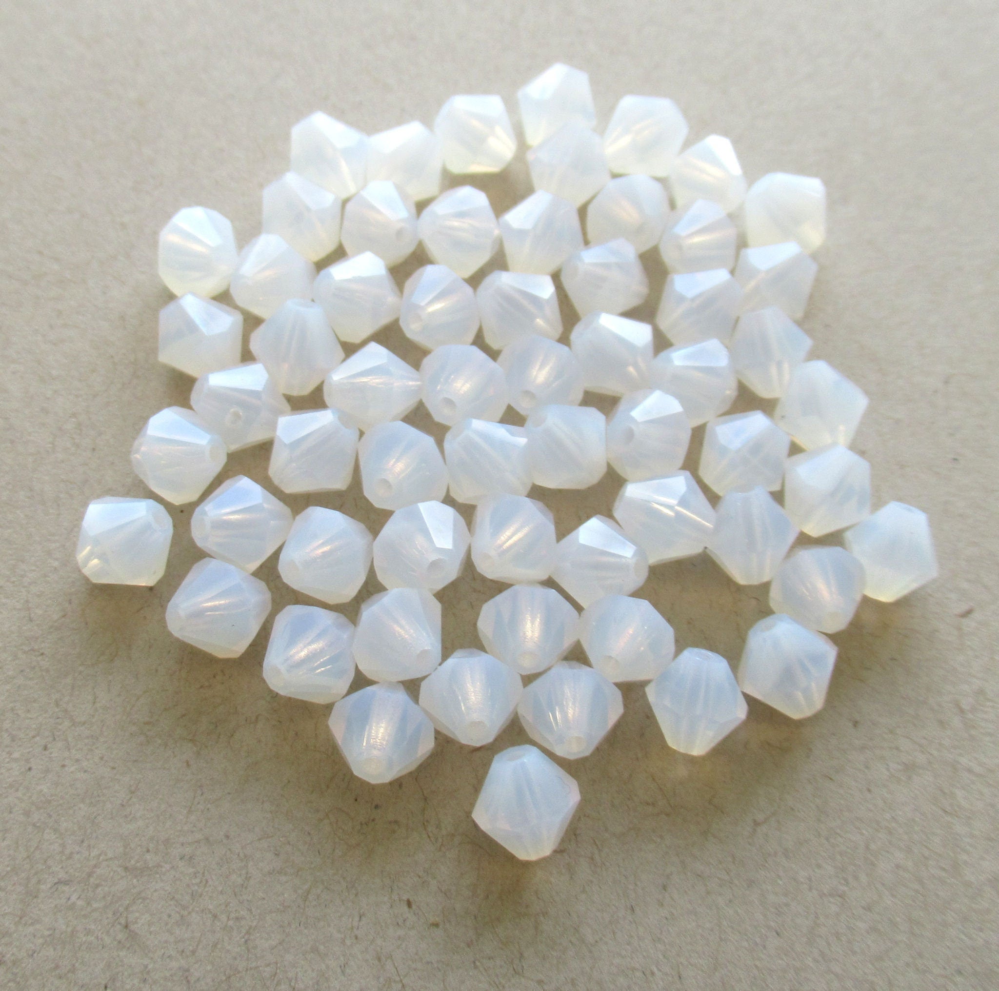 Lot of 24 6mm Czech glass Preciosa Crystal bicone beads - translucent milky white faceted glass bicones C00761