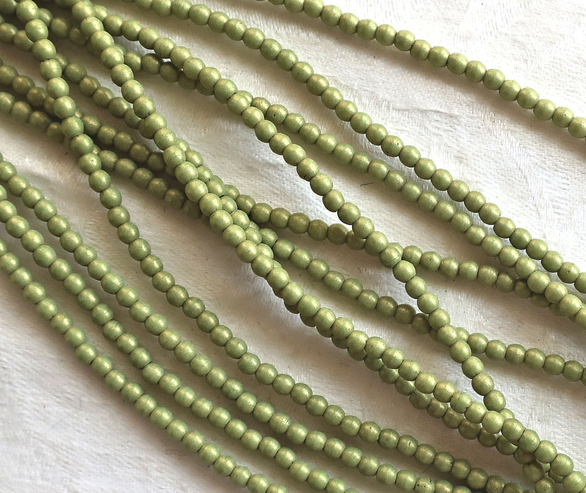 Lot of 100 3mm opaque green Czech glass druks, Pacifica Avocado smooth round druk beads C8901 - Glorious Glass Beads