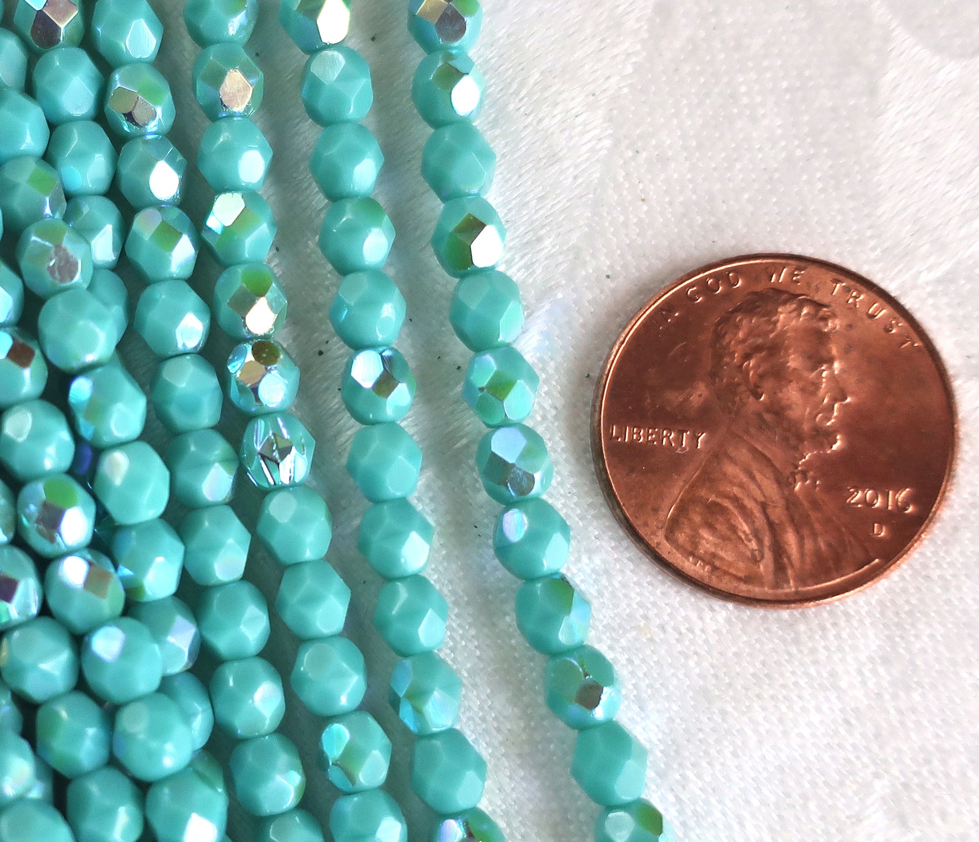 Lot of 50 4mm opaque Turquoise AB Czech glass beads, firepolished, faceted round beads, C9601 - Glorious Glass Beads