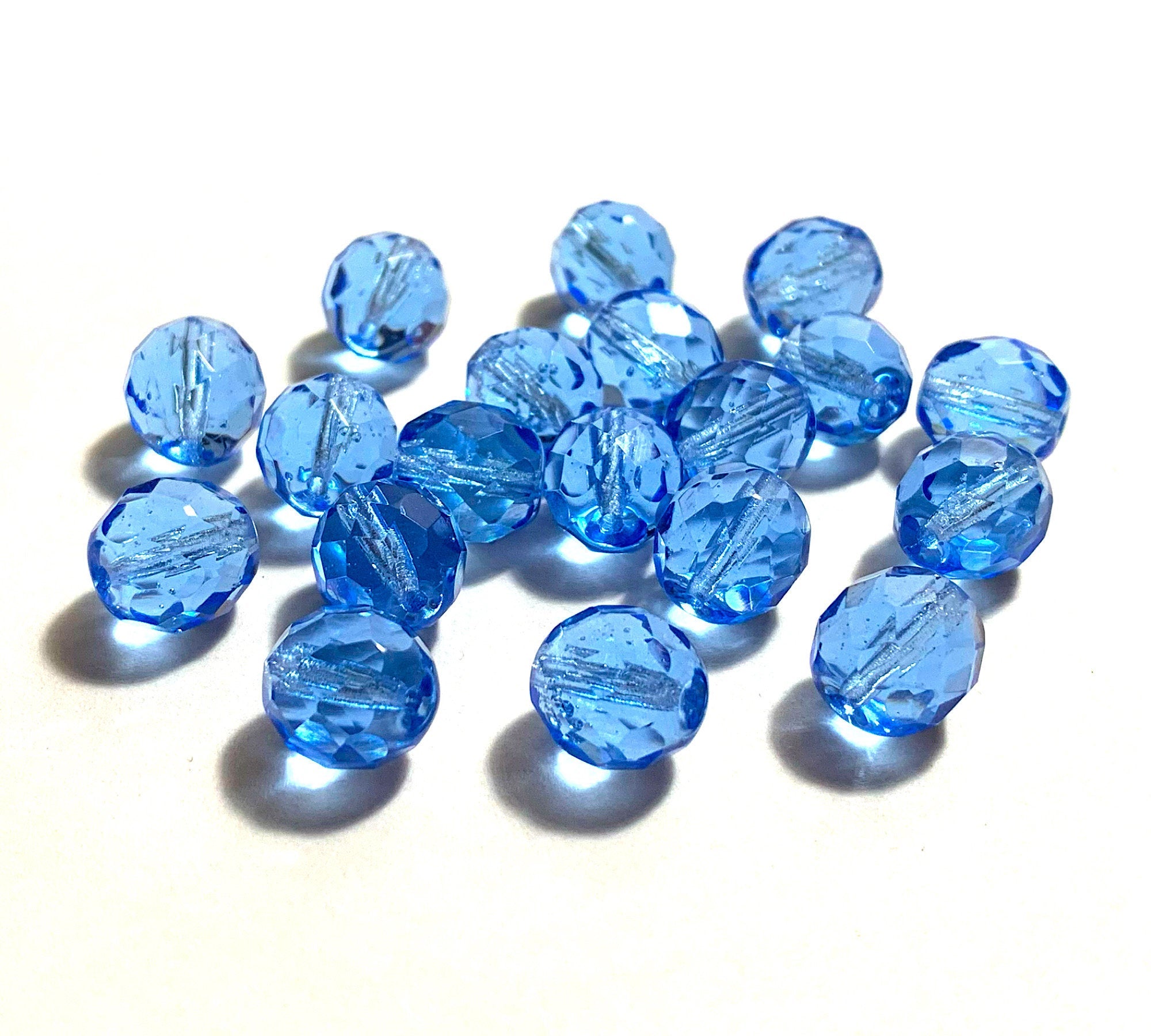 Twenty Czech glass fire polished faceted round beads - 10mm light sapphire blue beads C0096