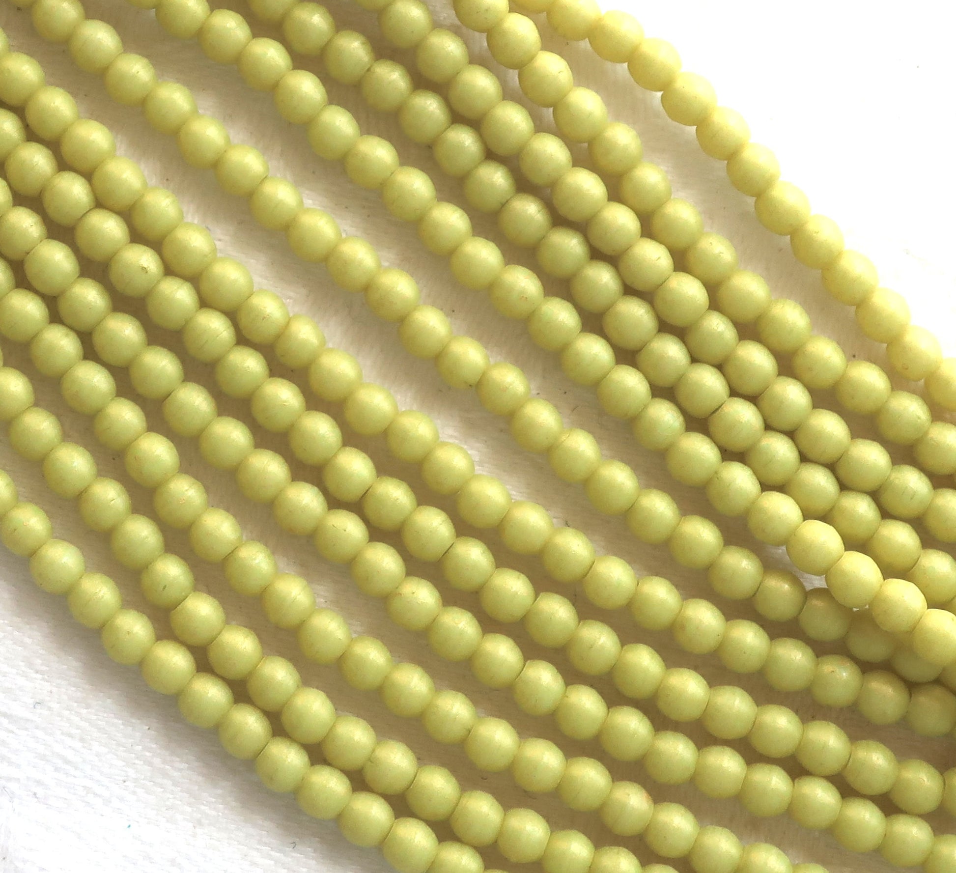 Lot of 100 3mm opaque light green Czech glass druks, Honeydew Pacifica smooth round druk beads C0701 - Glorious Glass Beads