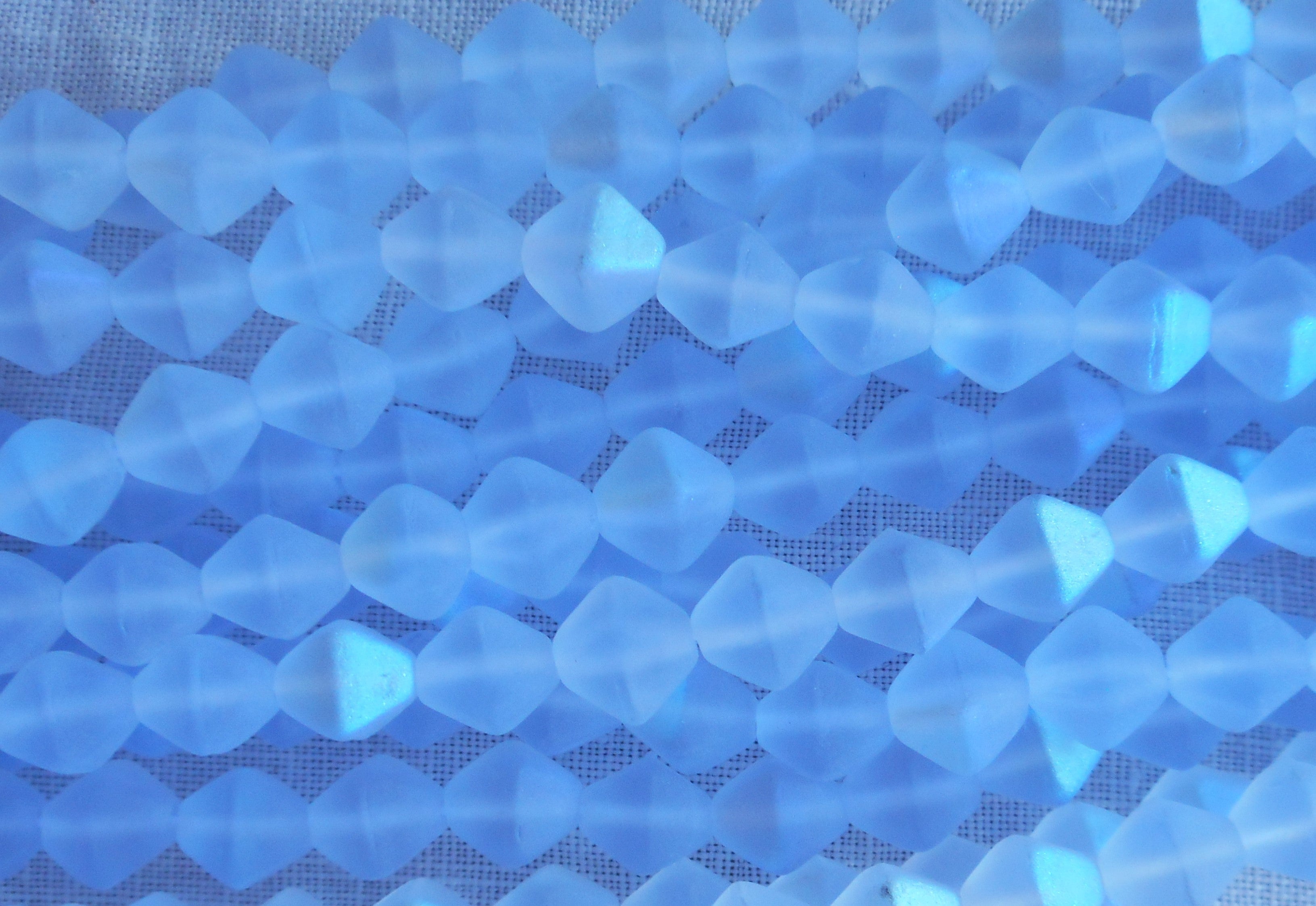 Fifty 6mm Matte Light Sapphire AB bicones, Iridescent blue pressed Czech glass bicone beads C8601