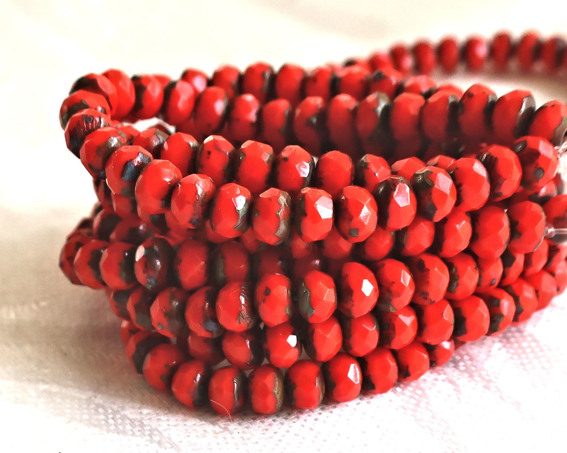 30 small, opaque bright red picasso puffy rondelle beads, 3mm x 5mm faceted Czech glass rondelles 51101 - Glorious Glass Beads