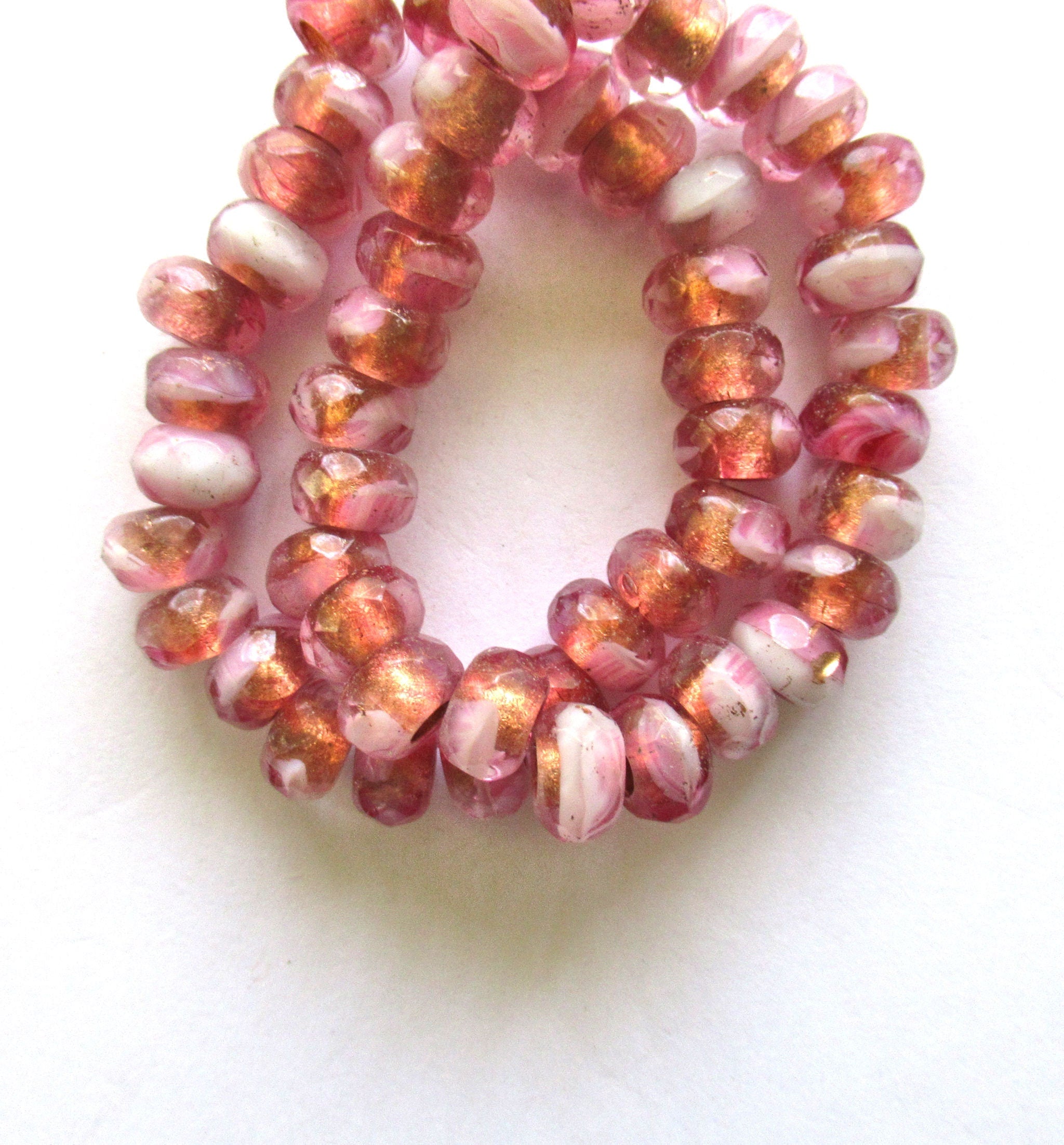 Ten Czech glass roller beads - 6 x 9mm pink & white marbled glass w/ copper linings, faceted roller, rondelle, big 3.5mm hole beads C00171