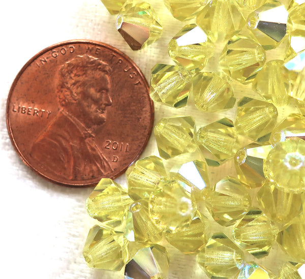 Lot of 24 6mm Czech Preciosa Crystal Jonquil AB glass faceted bicone beads, yellow AB bicones 11301 - Glorious Glass Beads