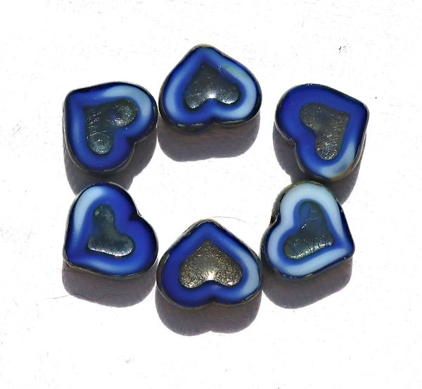 Six Czech glass heart beads; 14 x 12mm table cut, carved, opaque marbled royal blue & white glass hearts with a silver picasso finish C6906