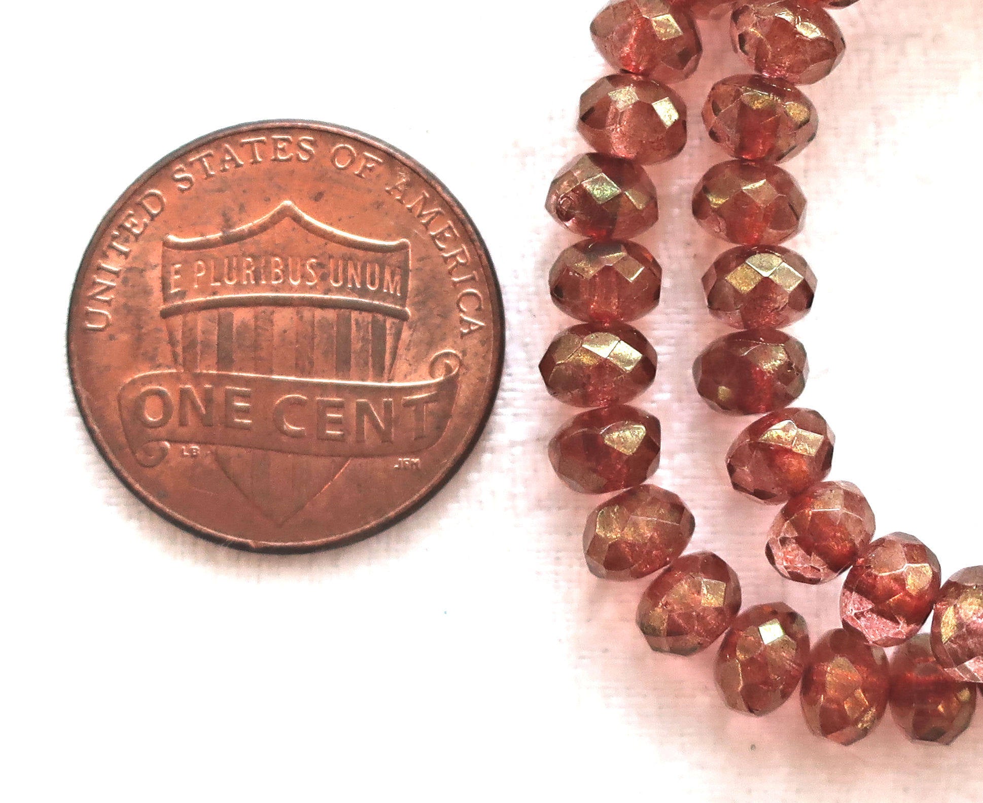 Lot of 30 small pink luster puffy rondelle beads, 3mm x 5mm faceted Czech glass rondelles 91101 - Glorious Glass Beads