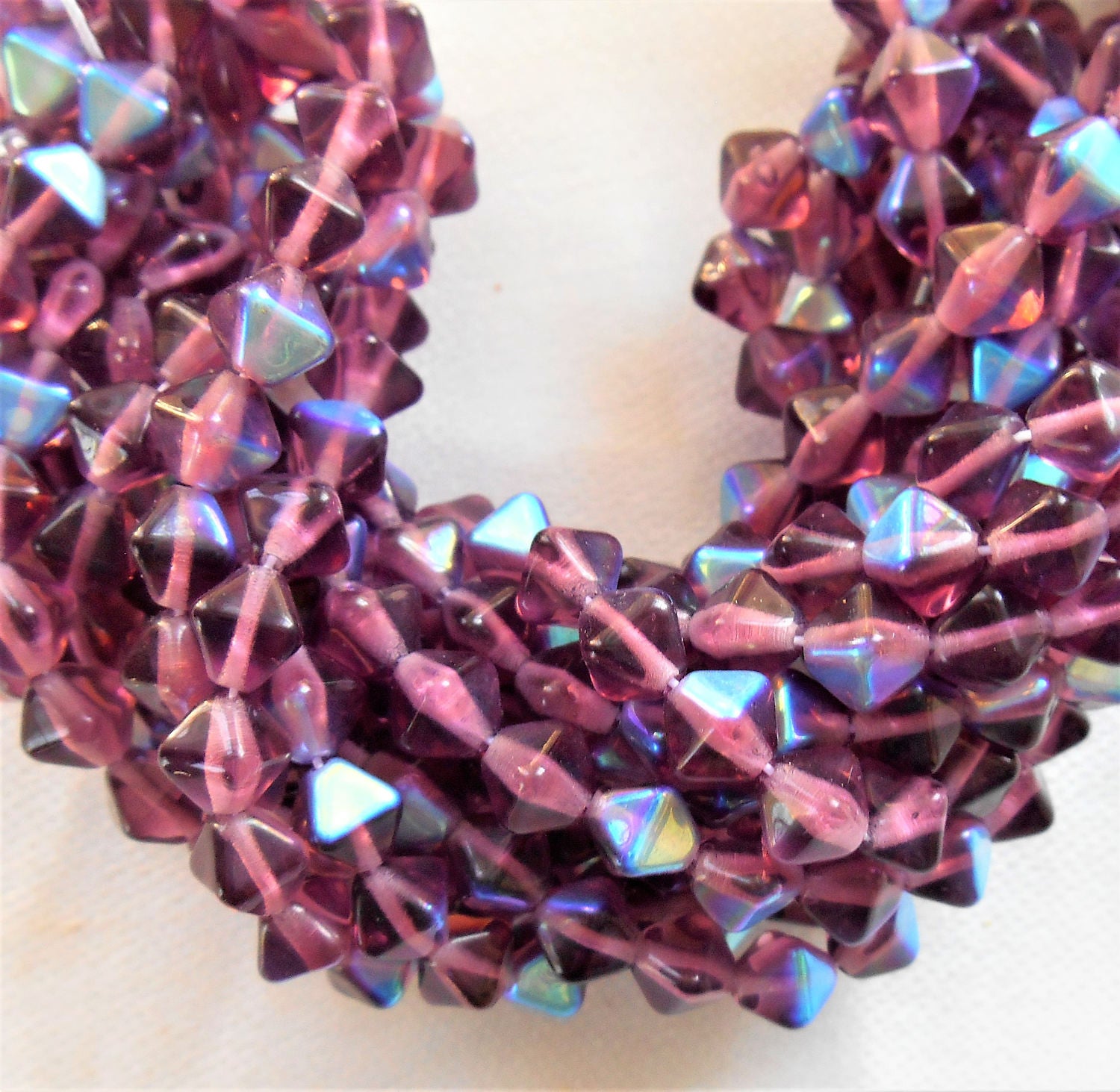 Fifty 6mm Amethyst AB bicones, Purple AB pressed glass Czech bicone beads C2701 - Glorious Glass Beads