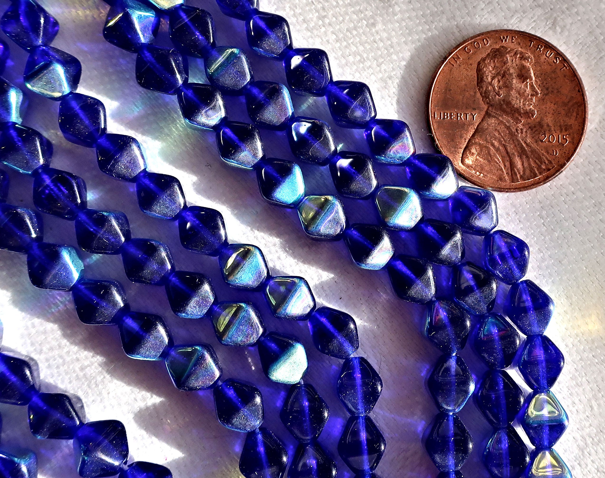 Fifty 6mm Cobalt Blue AB bicones, Czech pressed glass bicone beads, C3850 - Glorious Glass Beads