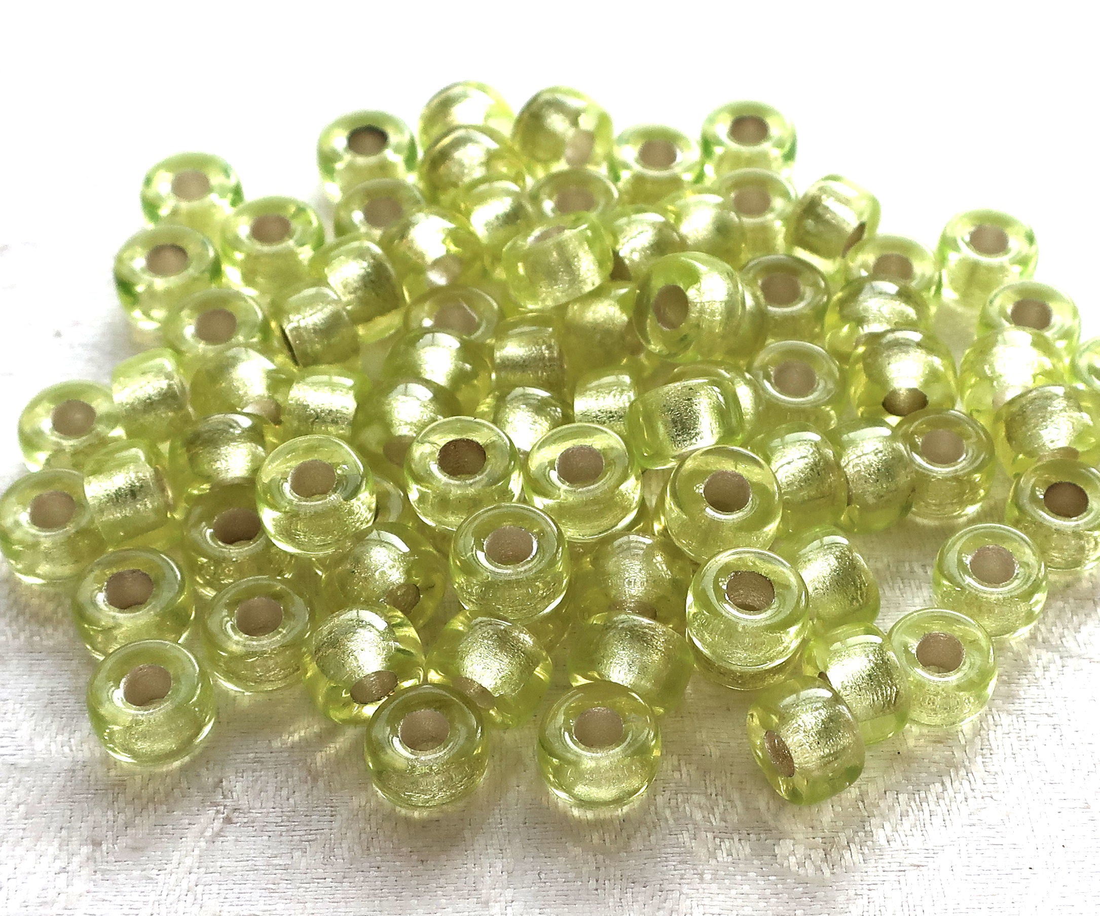 Lot of 25 9mm Jonquil yellow green silver lined Czech glass pony roller beads, large hole crow beads, C4601 - Glorious Glass Beads