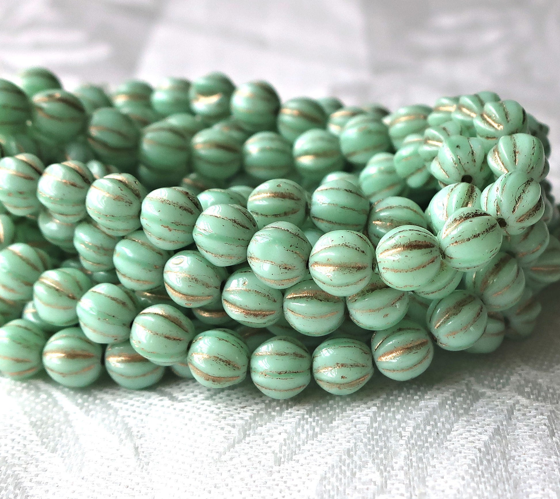 25 Czech glass melon beads, 6mm opaque mint green with gold accents, pressed striped beads C0901 - Glorious Glass Beads