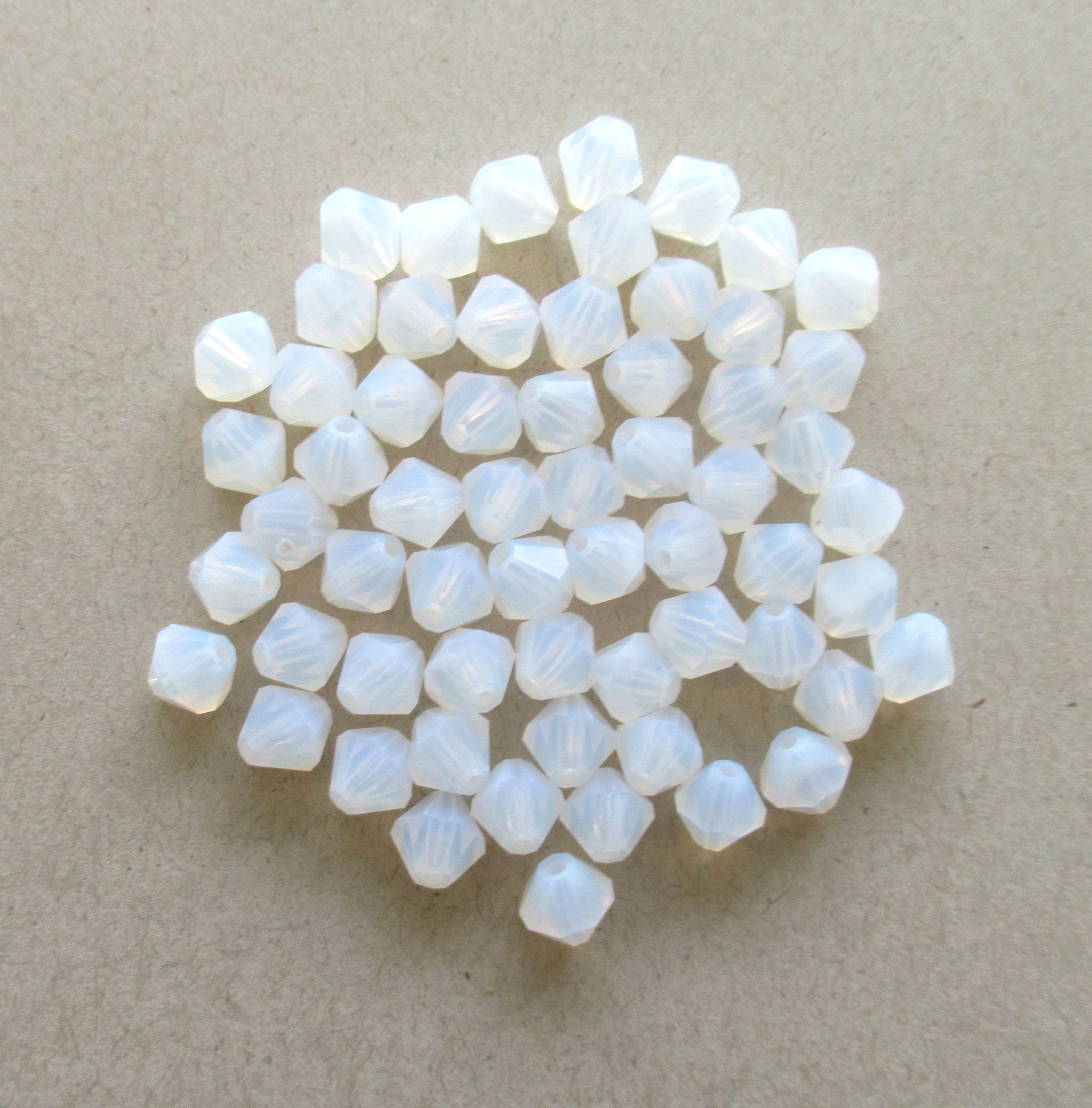 Lot of 24 6mm Czech glass Preciosa Crystal bicone beads - translucent milky white faceted glass bicones C00761