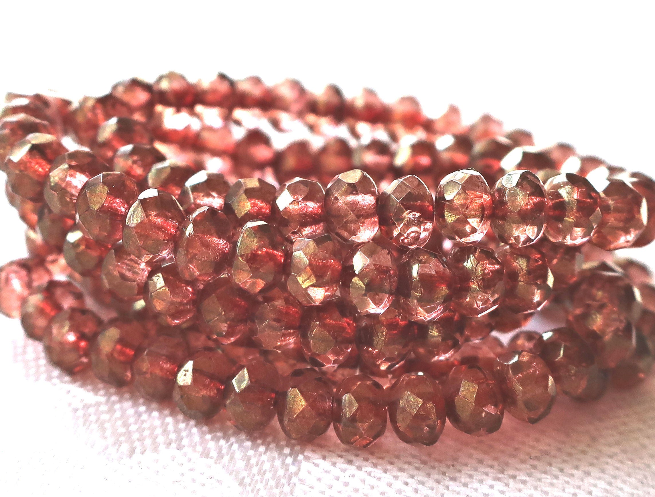 Lot of 30 small pink luster puffy rondelle beads, 3mm x 5mm faceted Czech glass rondelles 91101 - Glorious Glass Beads