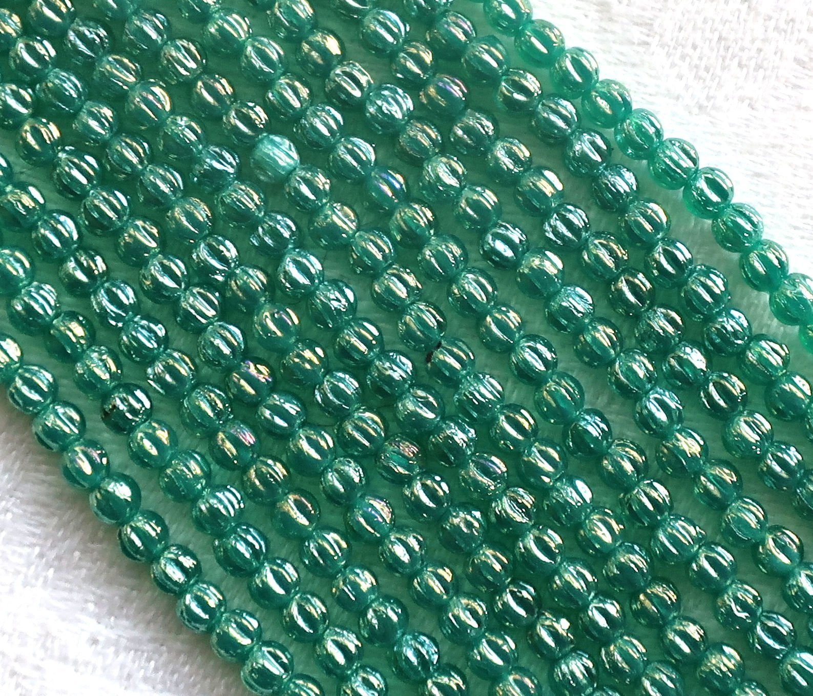 Lot of 100 Czech pressed glass melon beads - Luster Iris Atlantis Green - luster teal - luster viridian - C63101 - Glorious Glass Beads