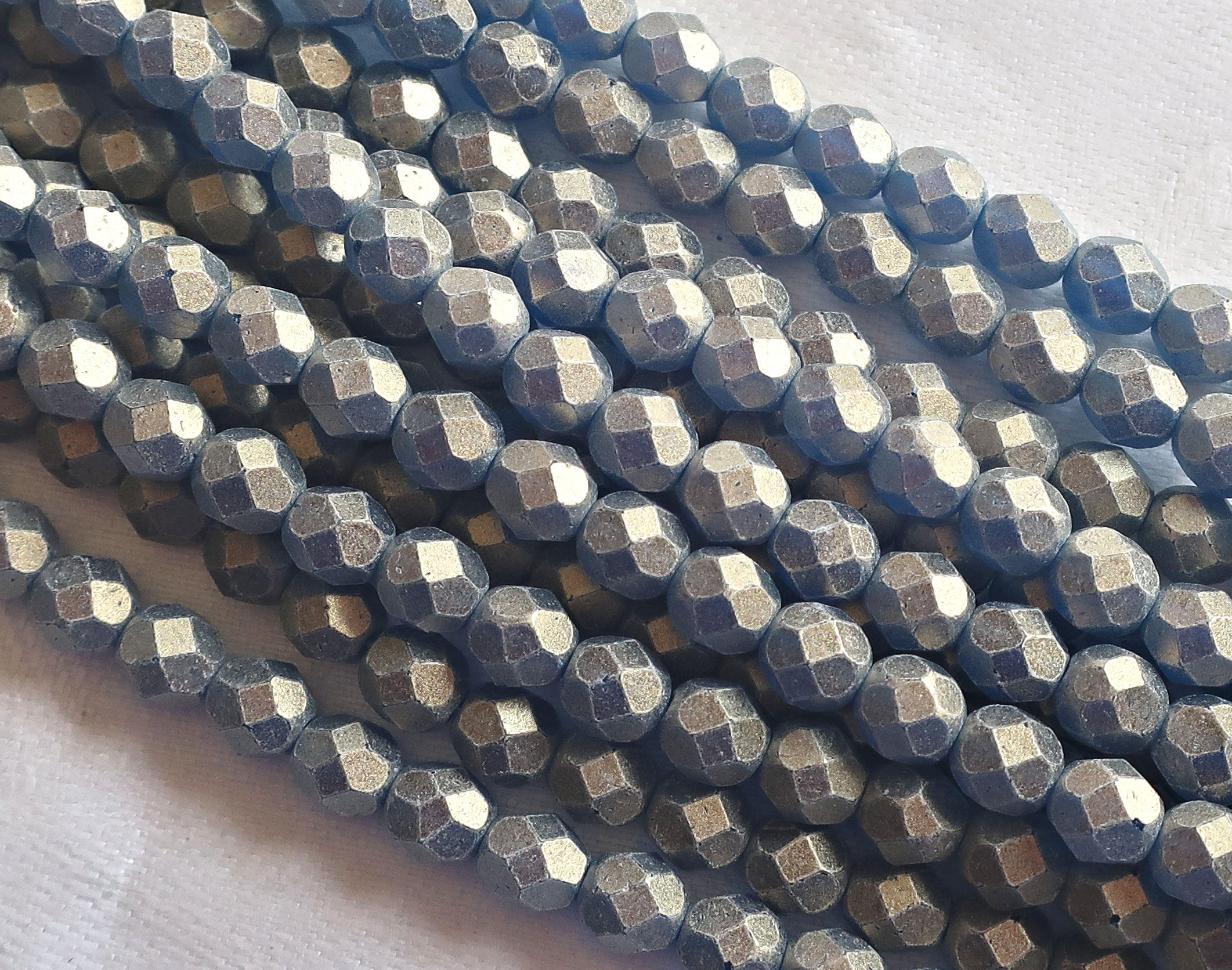 Lot of 25 6mm Sueded Gold Capri Blue Czech glass beads, firepolished, faceted round beads, with a frosty gold finish , C2525 - Glorious Glass Beads