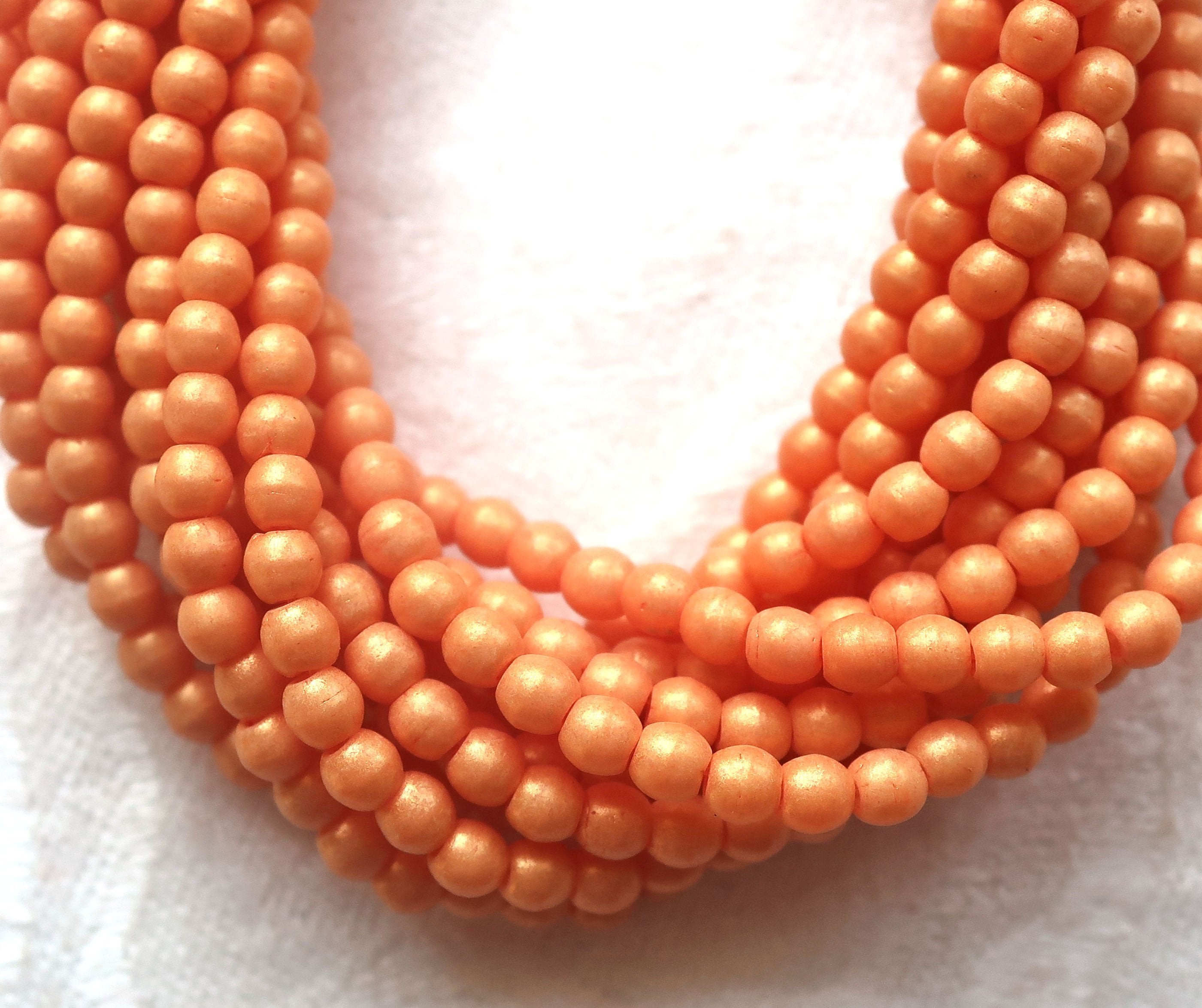 Lot of 100 3mm Czech glass druks; Pacifica Tangerine, opaque creamy orange pressed glass, smooth, round druk beads C7701 - Glorious Glass Beads