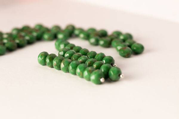 25 Czech glass faceted puffy rondelle beads - 6 x 8mm pea green luster C0251