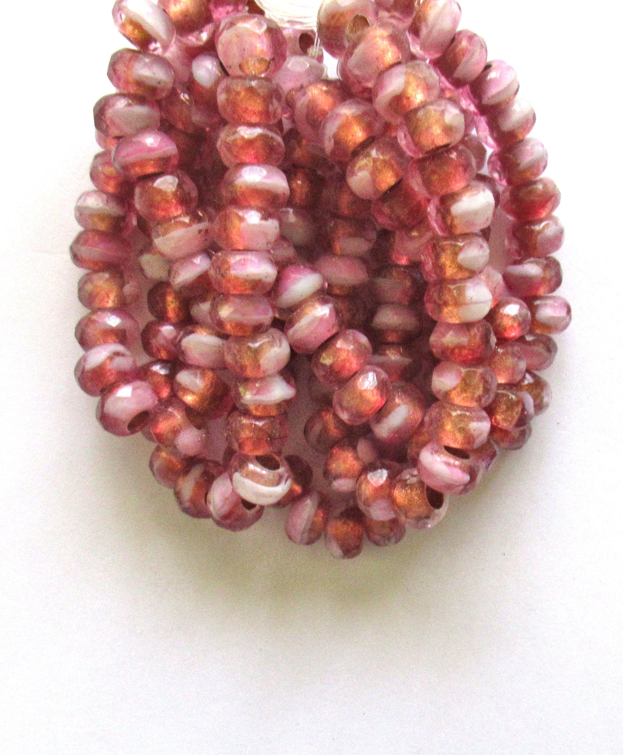 Ten Czech glass roller beads - 6 x 9mm pink & white marbled glass w/ copper linings, faceted roller, rondelle, big 3.5mm hole beads C00171