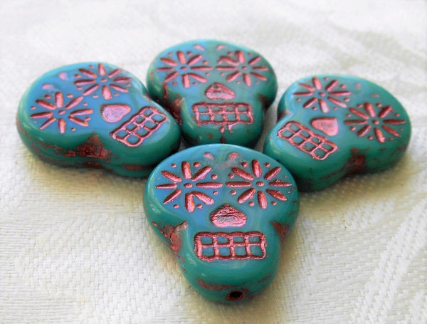 Four large turquoise blue & pink Czech glass skull beads, opaque turquoise blue glass with a pink wash, focal beads, 20mm x 17mm C02101