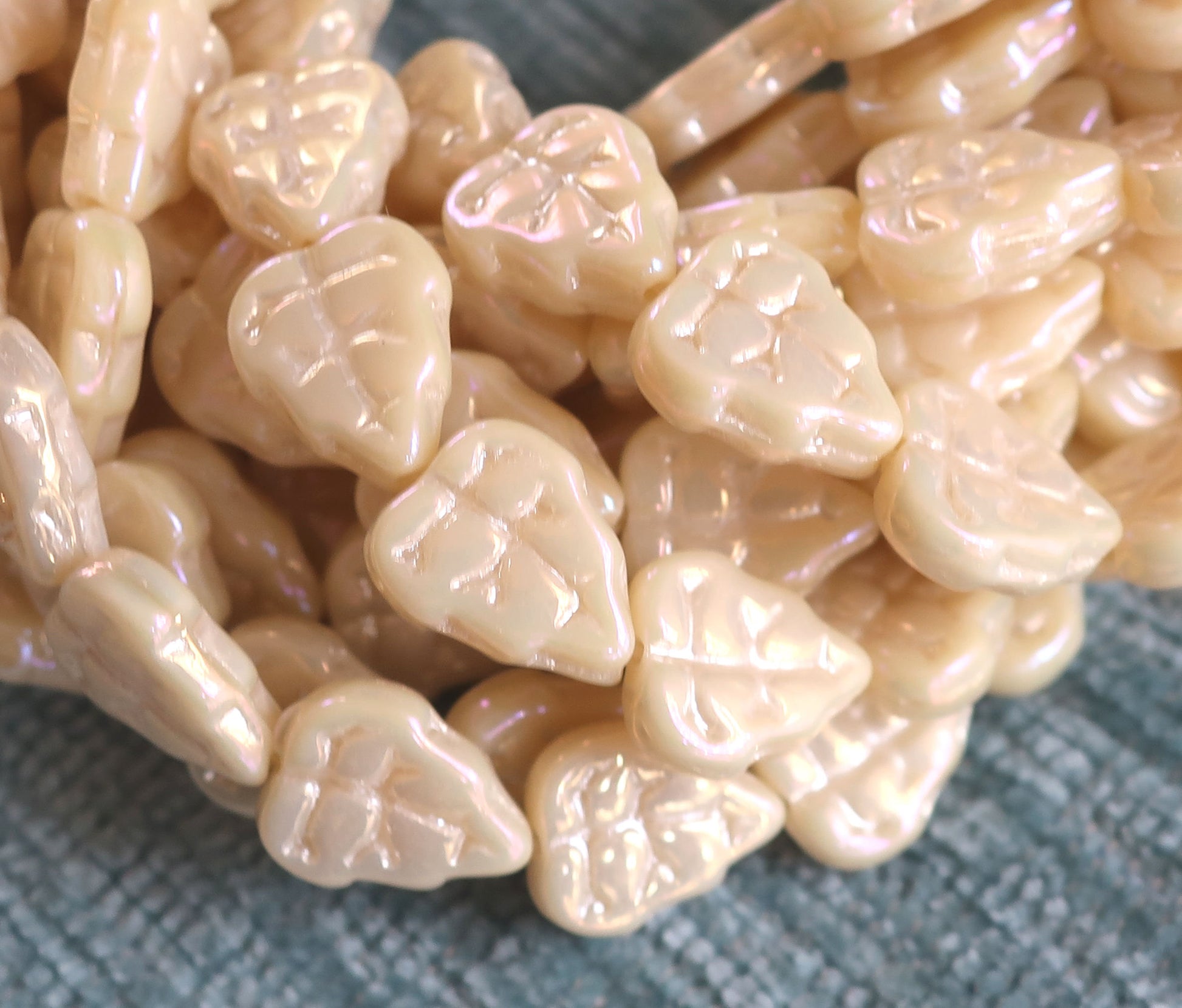 Lot of 25 Czech glass leaf beads, Luster iris opaque off white, champagne, center drilled 8 x 10mm beads 00101 - Glorious Glass Beads