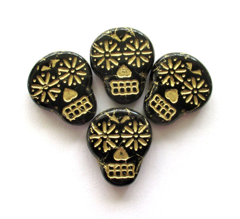 Four large black & gold Czech glass skull beads - opaque black glass with a gold wash - focal beads - 20mm x 17mm C00331