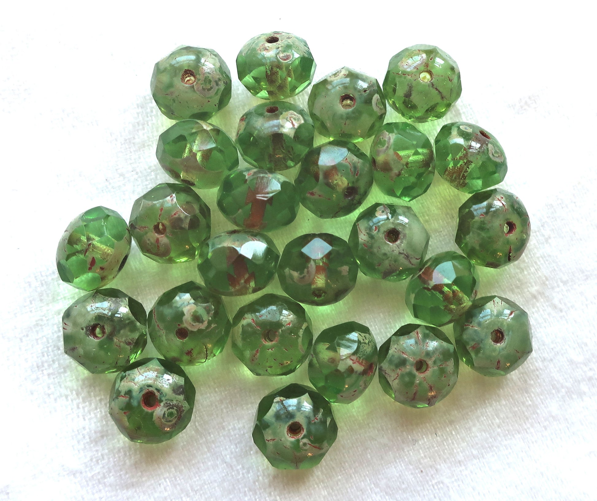 25 faceted Czech glass puffy rondelle beads, 8 x 6mm transparent peridot green picasso rondelles on sale 80101 - Glorious Glass Beads