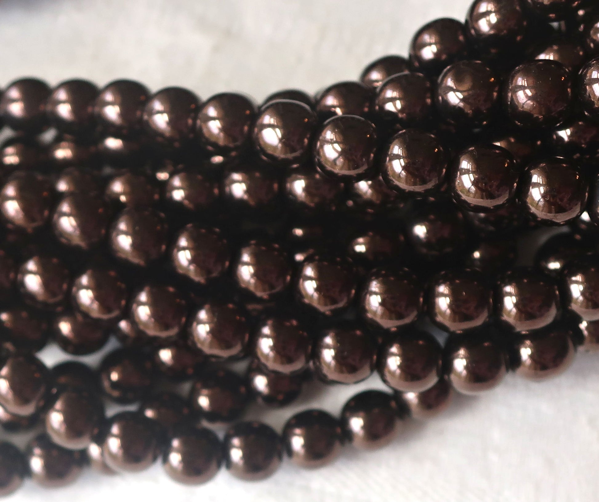 Lot of fifty 6mm Czech glass druks, Metallic Dark Chocolate Bronze smooth round Czech glass druk beads C92101 - Glorious Glass Beads