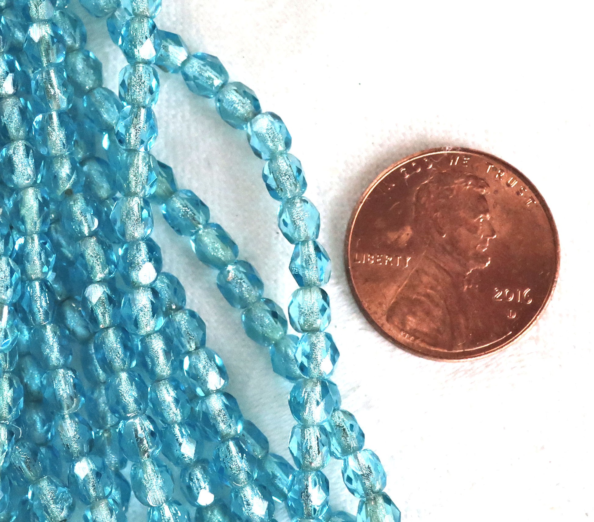 Lot of 50 4mm Aqua Blue silver lined Czech glass beads, Aquamarine firepolished faceted round beads C9601 - Glorious Glass Beads