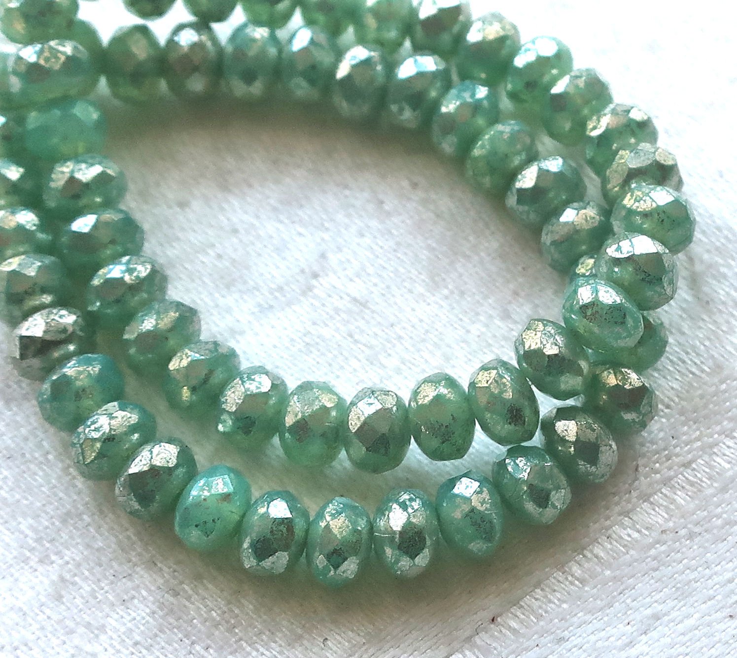 30 small puffy rondelle beads, mint green with a silvery mercury finish, 3mm x 5mm faceted Czech glass rondelles 53101 - Glorious Glass Beads