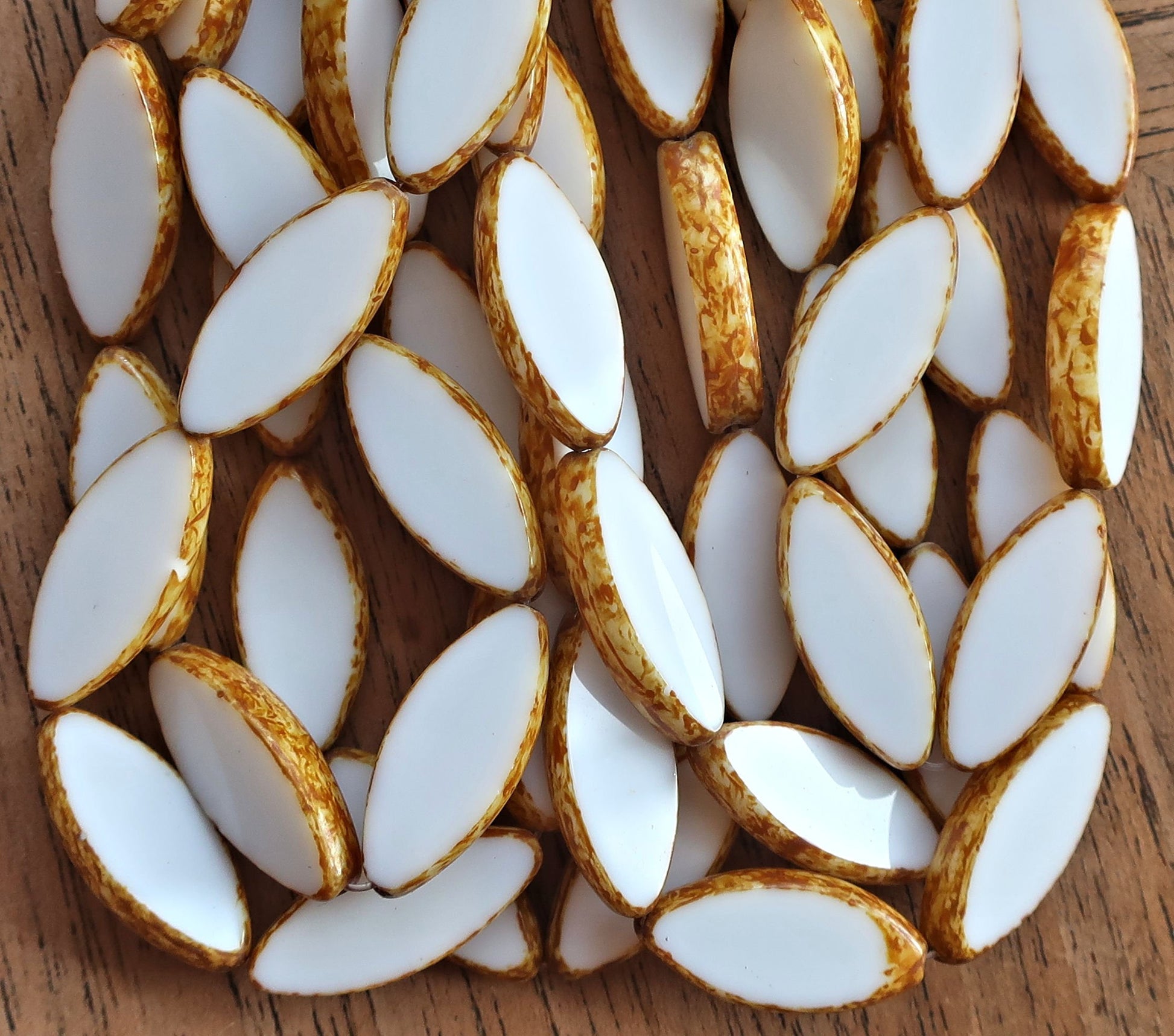 Ten opaque chalk white picasso spindle beads - 7 x 18mm - table cut almond shaped Czech glass tube beads 50201 - Glorious Glass Beads