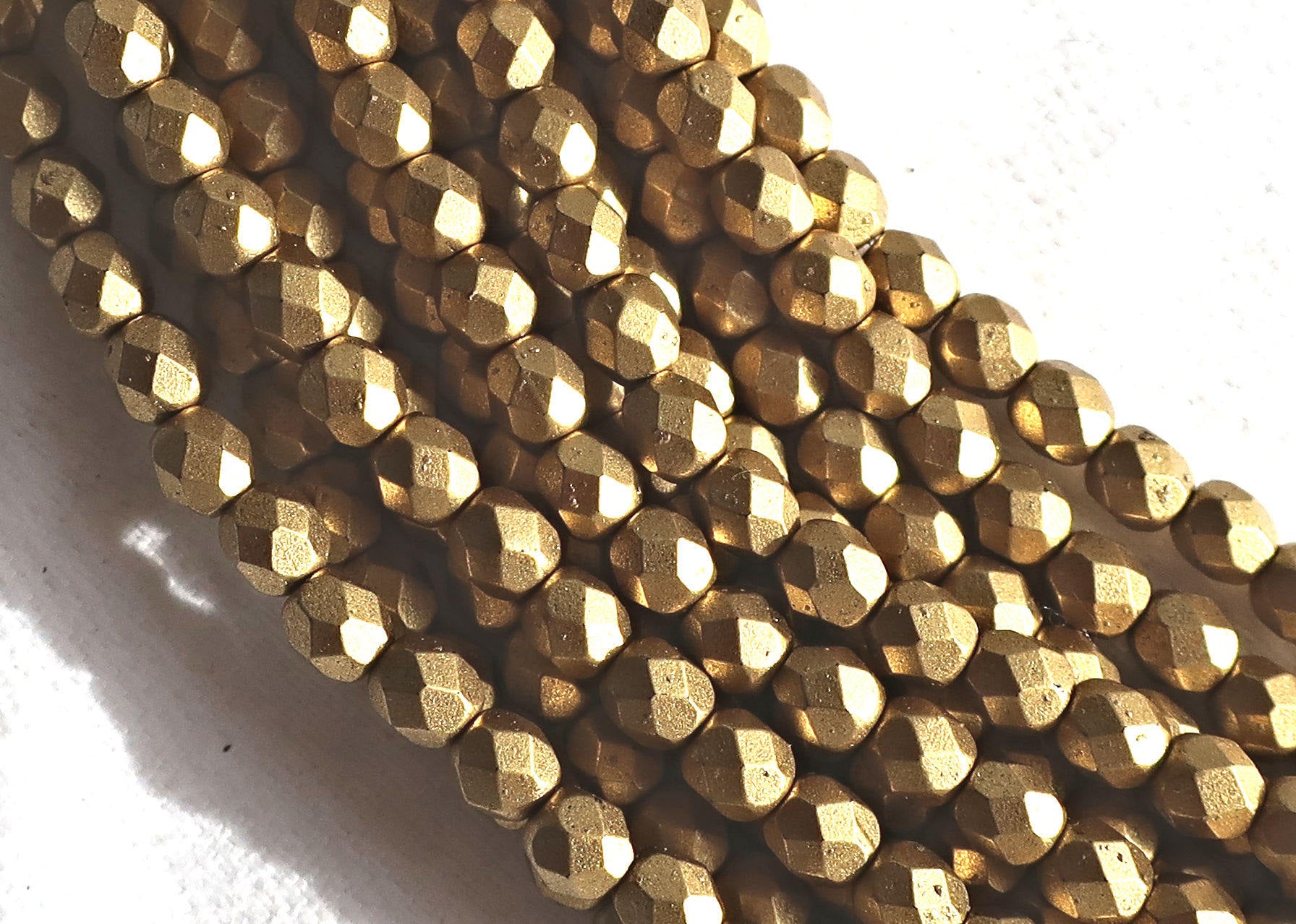 Lot of 50 4mm Matte Metallic Aztec Gold, faceted round firepolished glass beads C9650 - Glorious Glass Beads