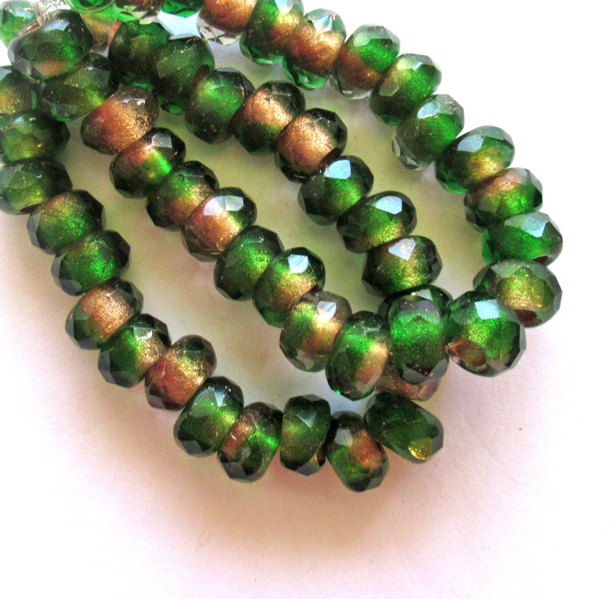 Ten Czech glass roller beads - 6 x 9mm emerald green & crystal marbled gold lined, faceted roller, rondelle, big 3.5mm hole beads C00801