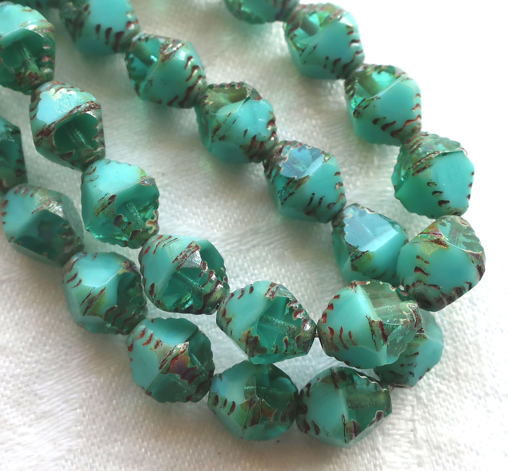 Lot of 15 Czech glass bicones, turquoise blue green opaque and transparent mix picasso carved faceted 8 x 10mm large bicone beads, C07201 - Glorious Glass Beads