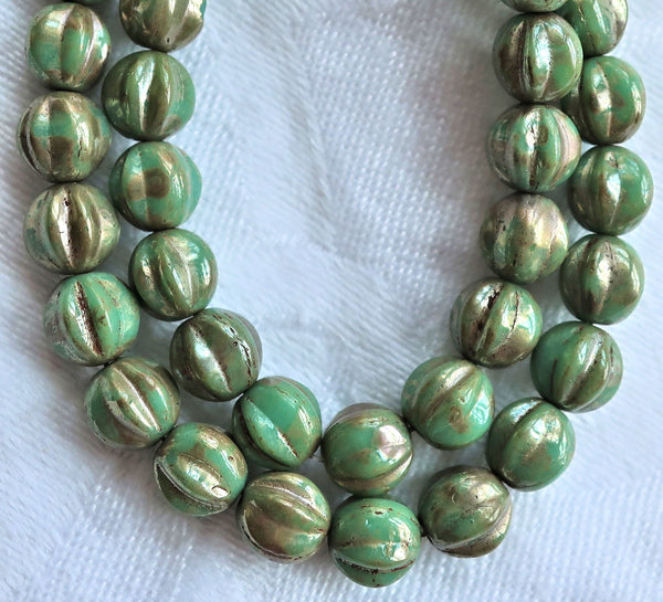 Lot of 25 6mm pressed Czech glass melon beads, turquoise green beads with gold accents C0901