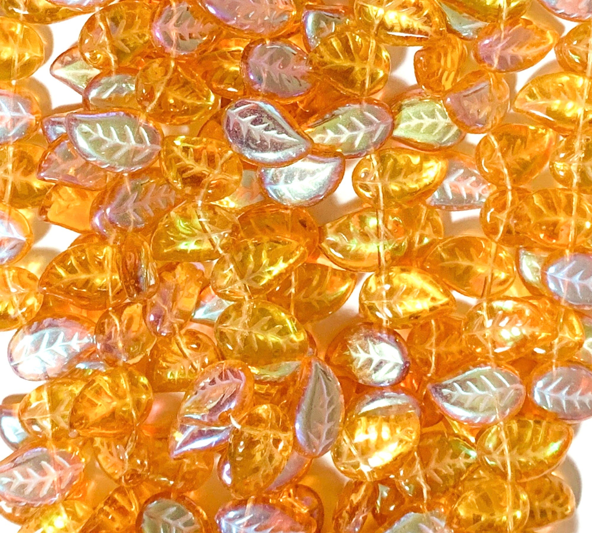 25 Czech glass side drilled eucalyptus leaf beads - 12 x 9mm topaz AB leaves - textured pressed glass beads - C0077